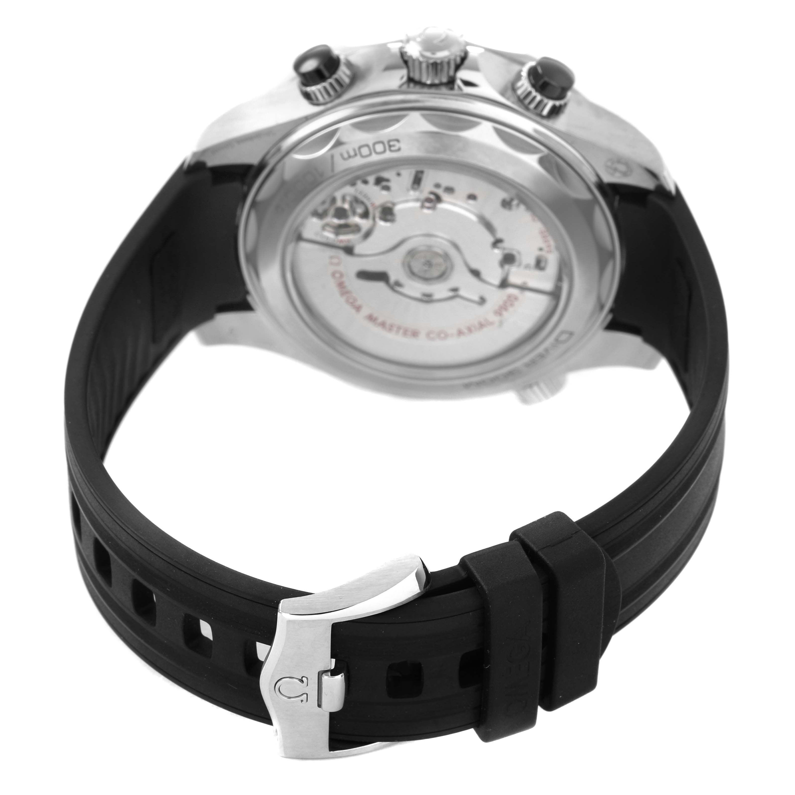 The image shows the back view of an Omega Seamaster 210.30.44.51.01.001 Men's Stainless Steel Black Dial watch, highlighting the movement and rubber strap with a steel clasp.