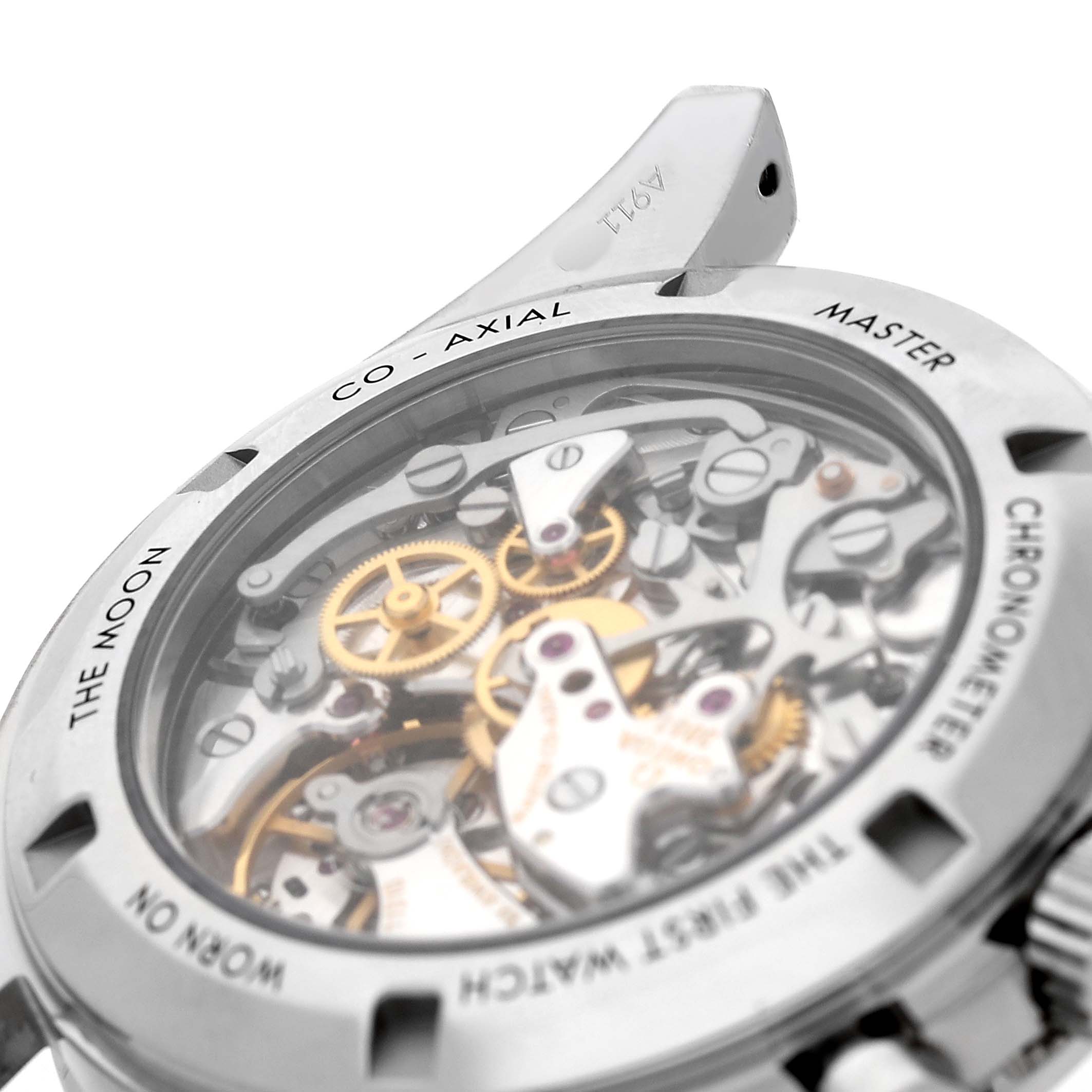The image shows the rear view of the Omega Speedmaster 310.30.42.50.04.001 Men's Stainless Steel White Dial, highlighting its mechanical movement through the transparent case back.