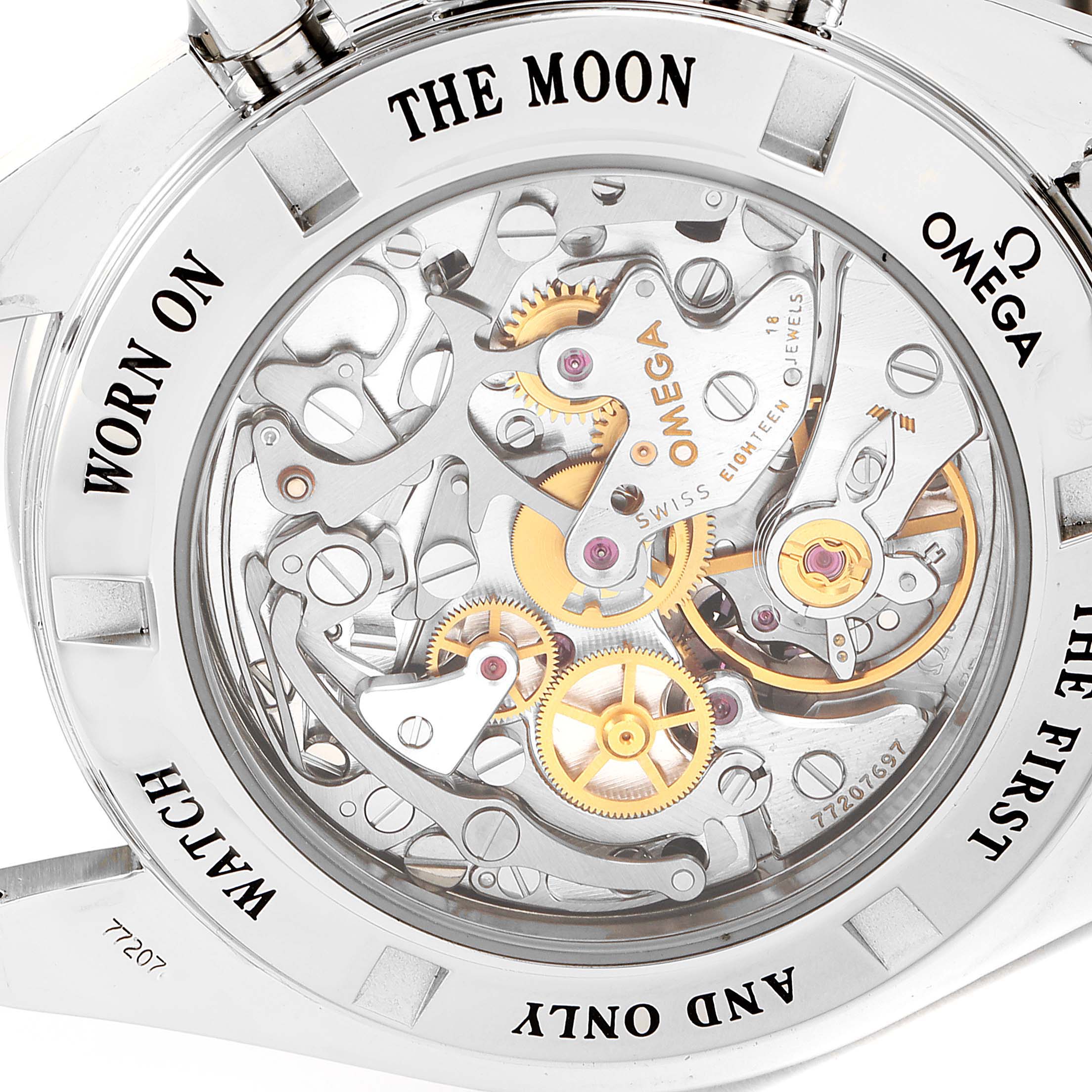 The image shows the back view of an Omega Speedmaster 3573.50.00 Men
s Stainless Steel Black Dial 3573.50.00 Men
s Stainless Steel Black Dial watch, highlighting its intricate mechanical movement.