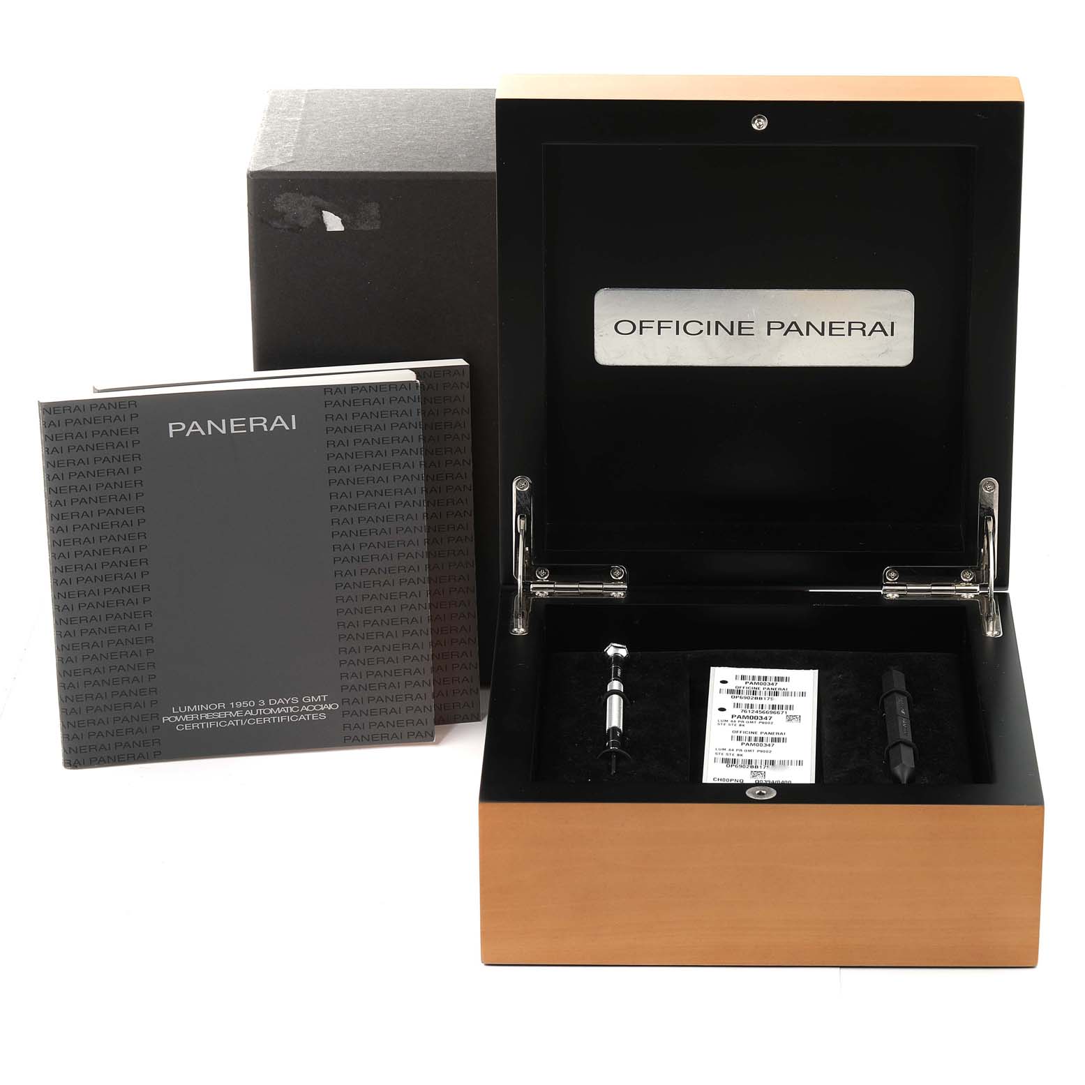 The image shows an open Panerai Luminor PAM00347 Men
s Stainless Steel Black Dial PAM00347 Men
s Stainless Steel Black Dial watch box with tools and manuals, viewed from a front angle.