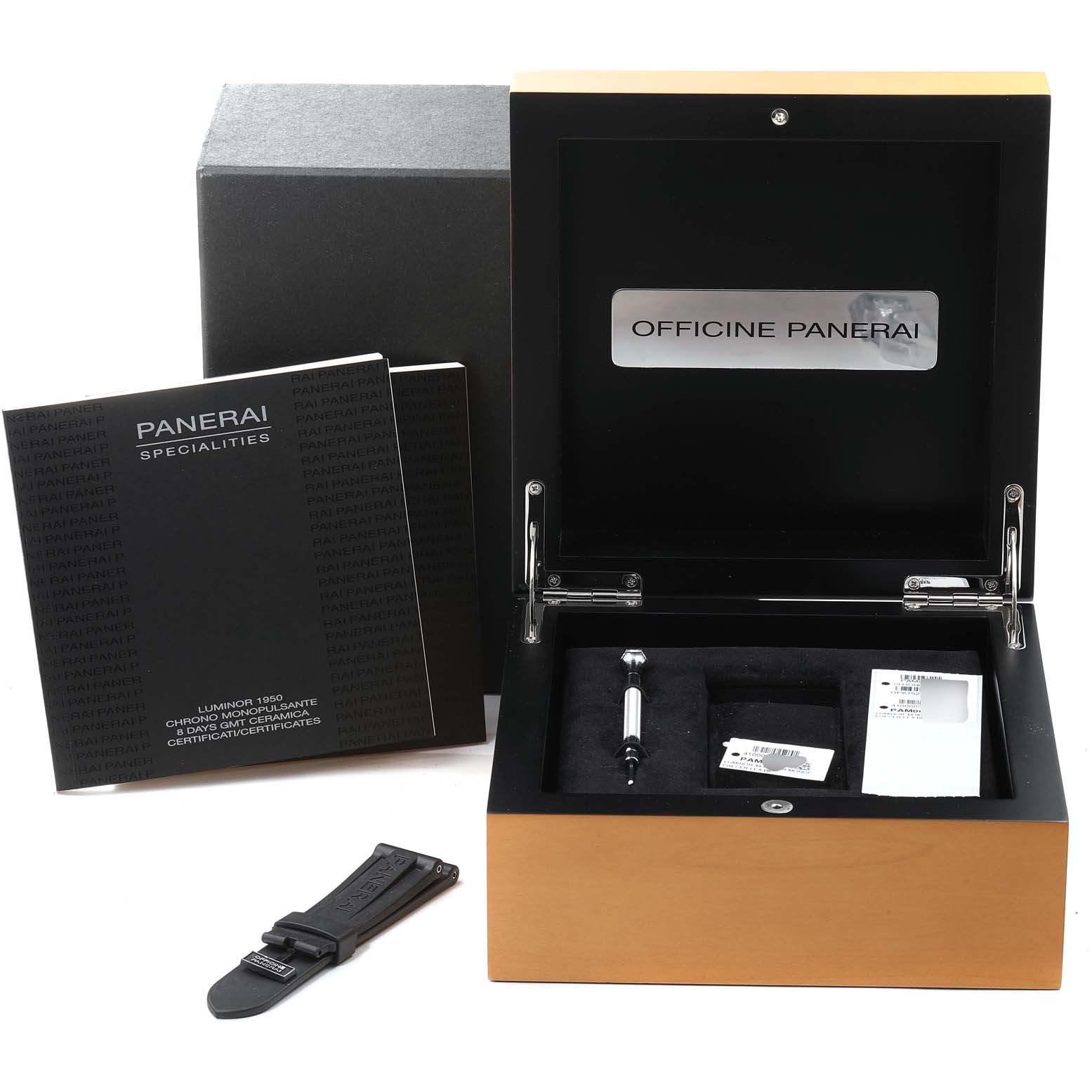 A Panerai Luminor PAM00317 Men's Ceramic Black Dial PAM00317 Men's Ceramic Black Dial watch box set, including manuals, an extra strap, and tools, viewed from the front.