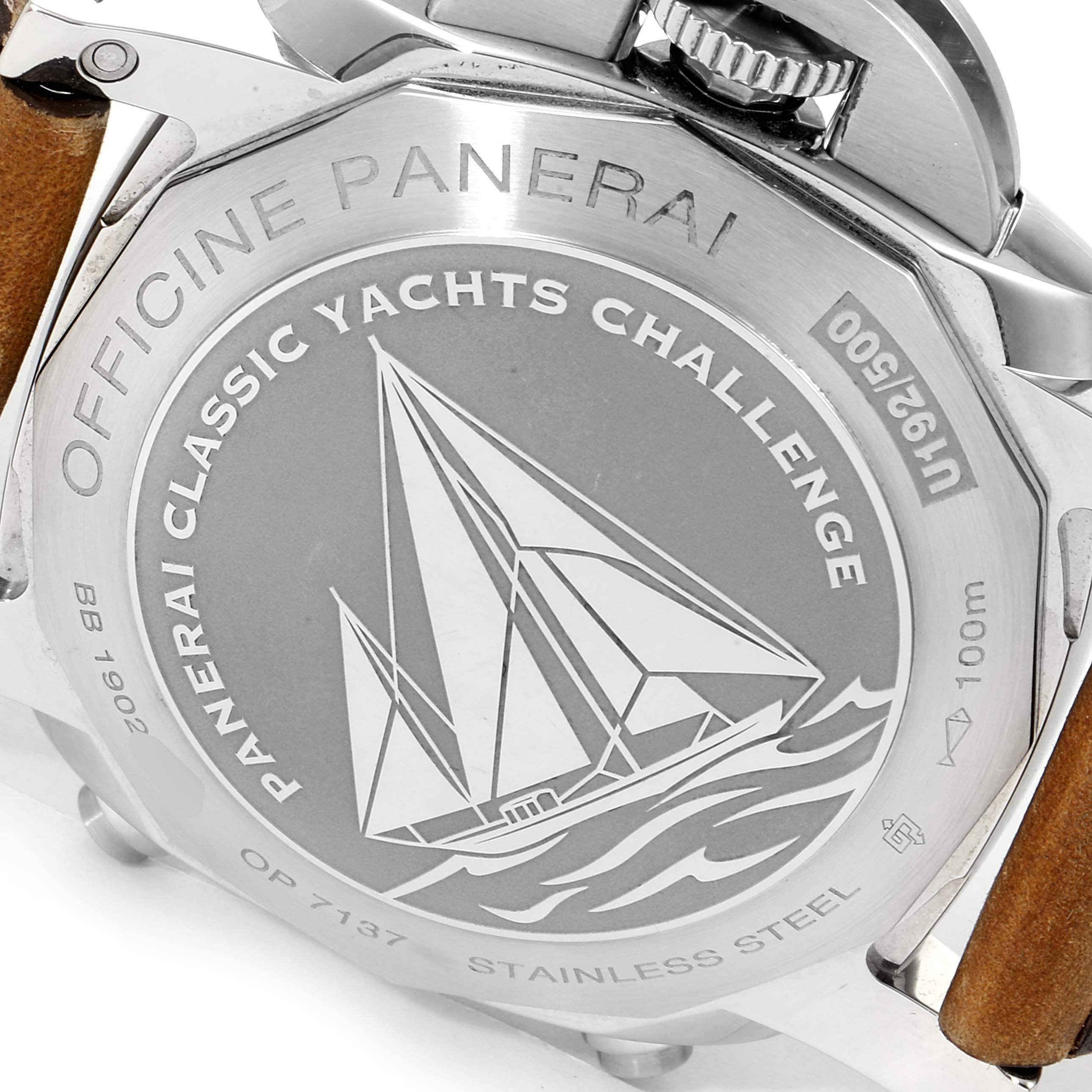 The image shows the back case of a Panerai Luminor PAM00653 Men
s Stainless Steel Black Dial PAM00653 Men
s Stainless Steel Black Dial watch, featuring an engraving of a yacht and detailing from the Classic Yachts Challenge.