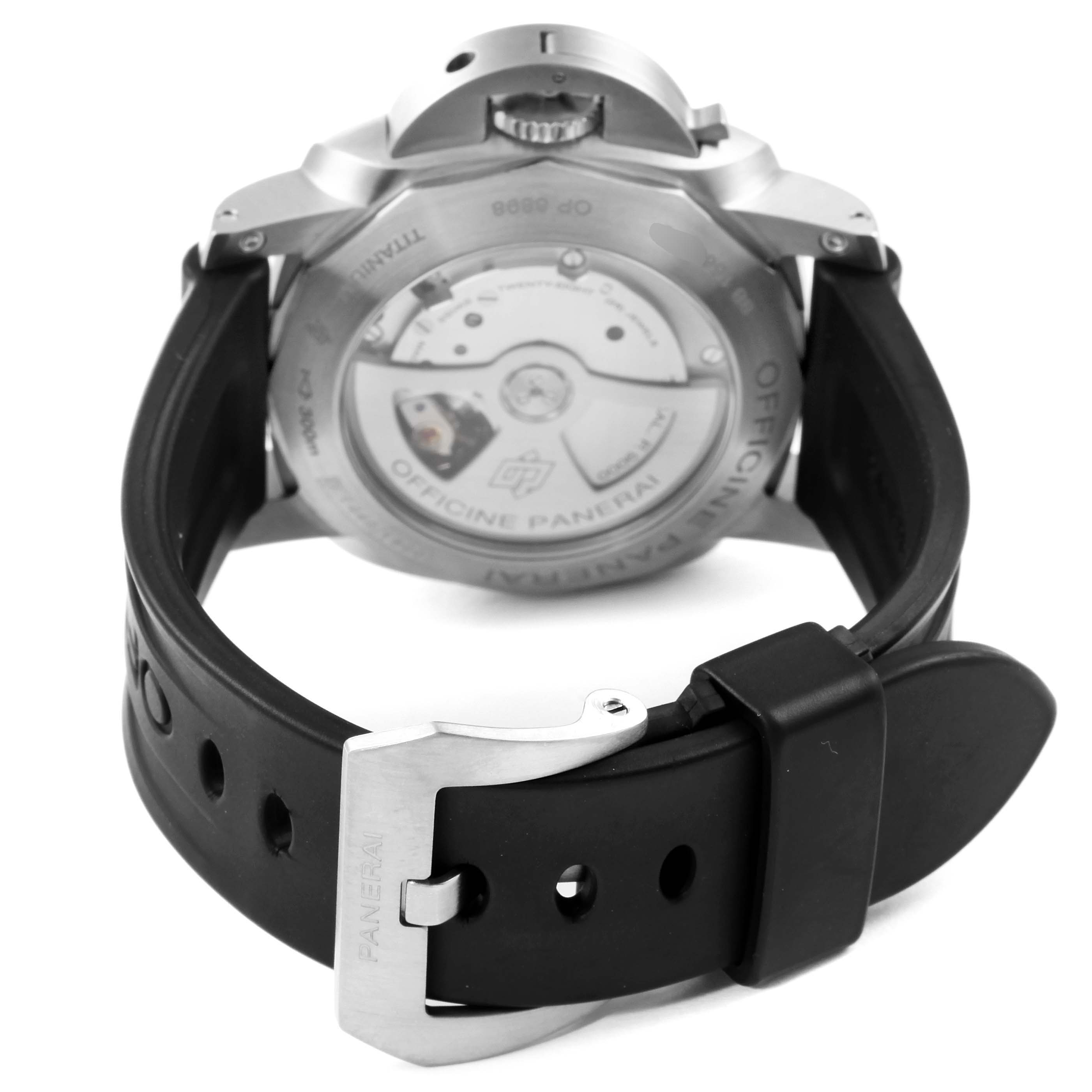 The image shows the back view of a Panerai Luminor PAM00351 Men's Titanium Black Dial PAM00351 Men's Titanium Black Dial watch, highlighting its movement and black rubber strap with a branded buckle.