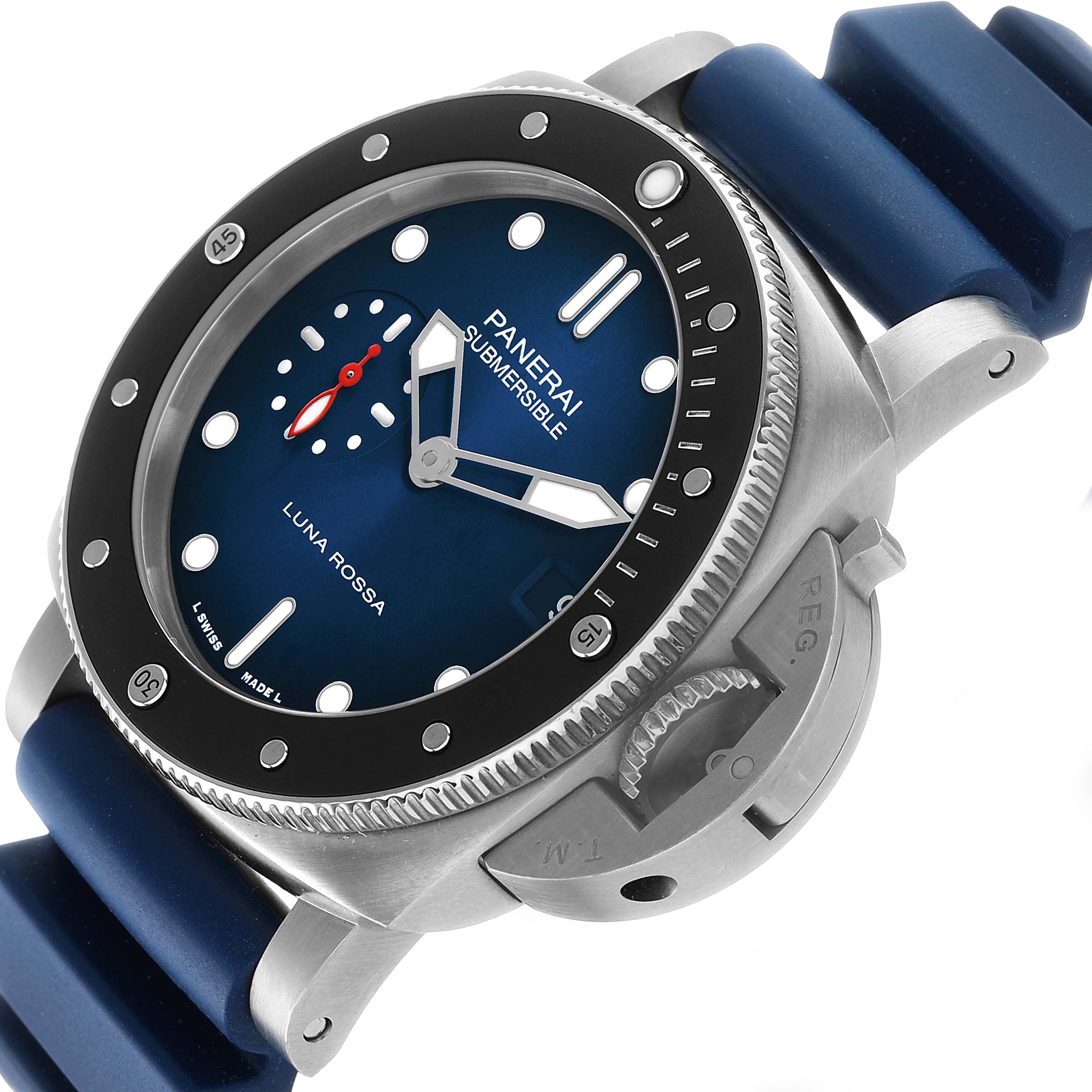 The Panerai Submersible PAM01565 Men's Stainless Steel Blue Dial watch is shown at a slightly angled top view, highlighting its bezel, dial, and crown guard.