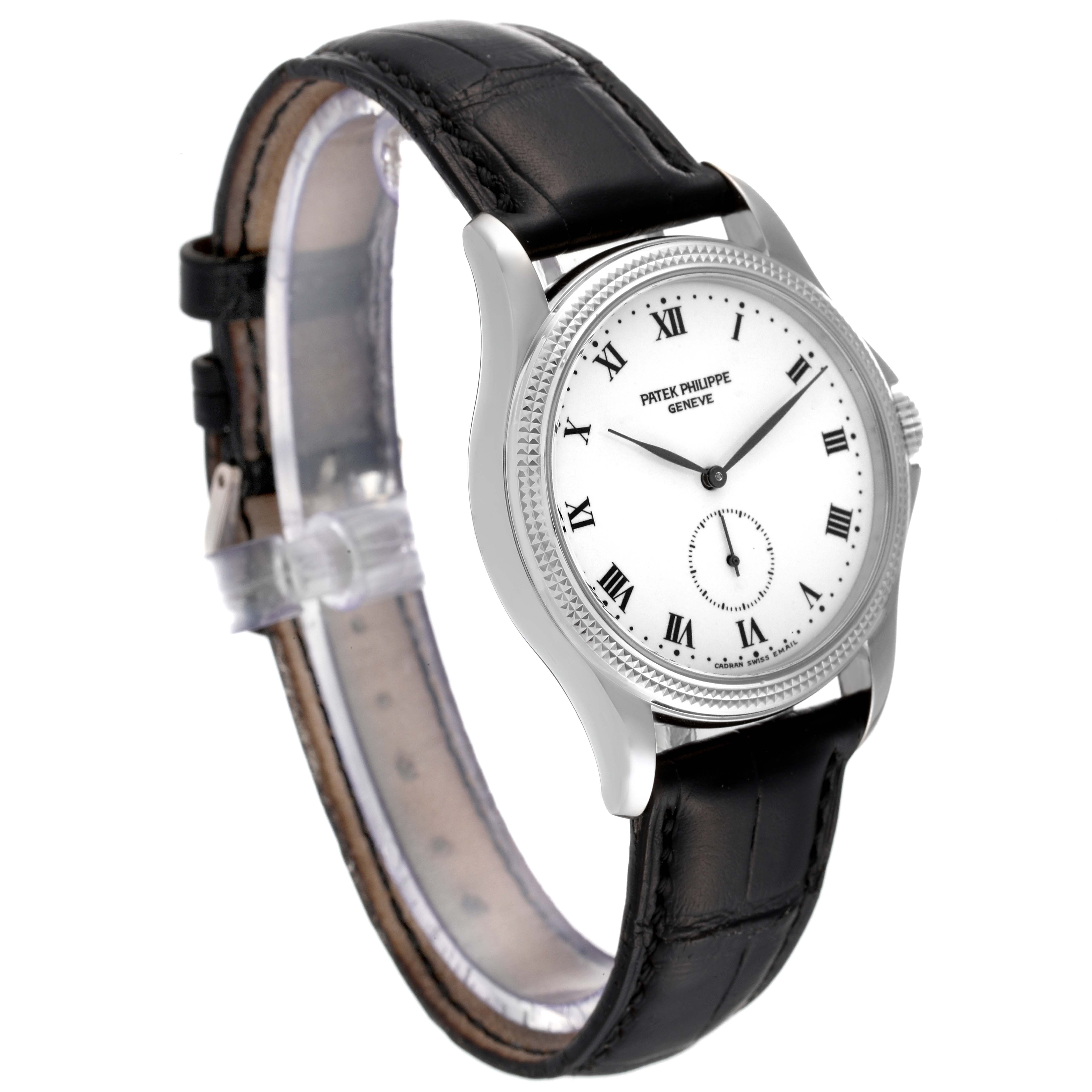 This image shows a side angle view of the Patek Philippe Calatrava 5115G-001 Men's White Gold White Dial 5115G-001 Men's White Gold White Dial watch, highlighting its face, bezel, and leather strap.