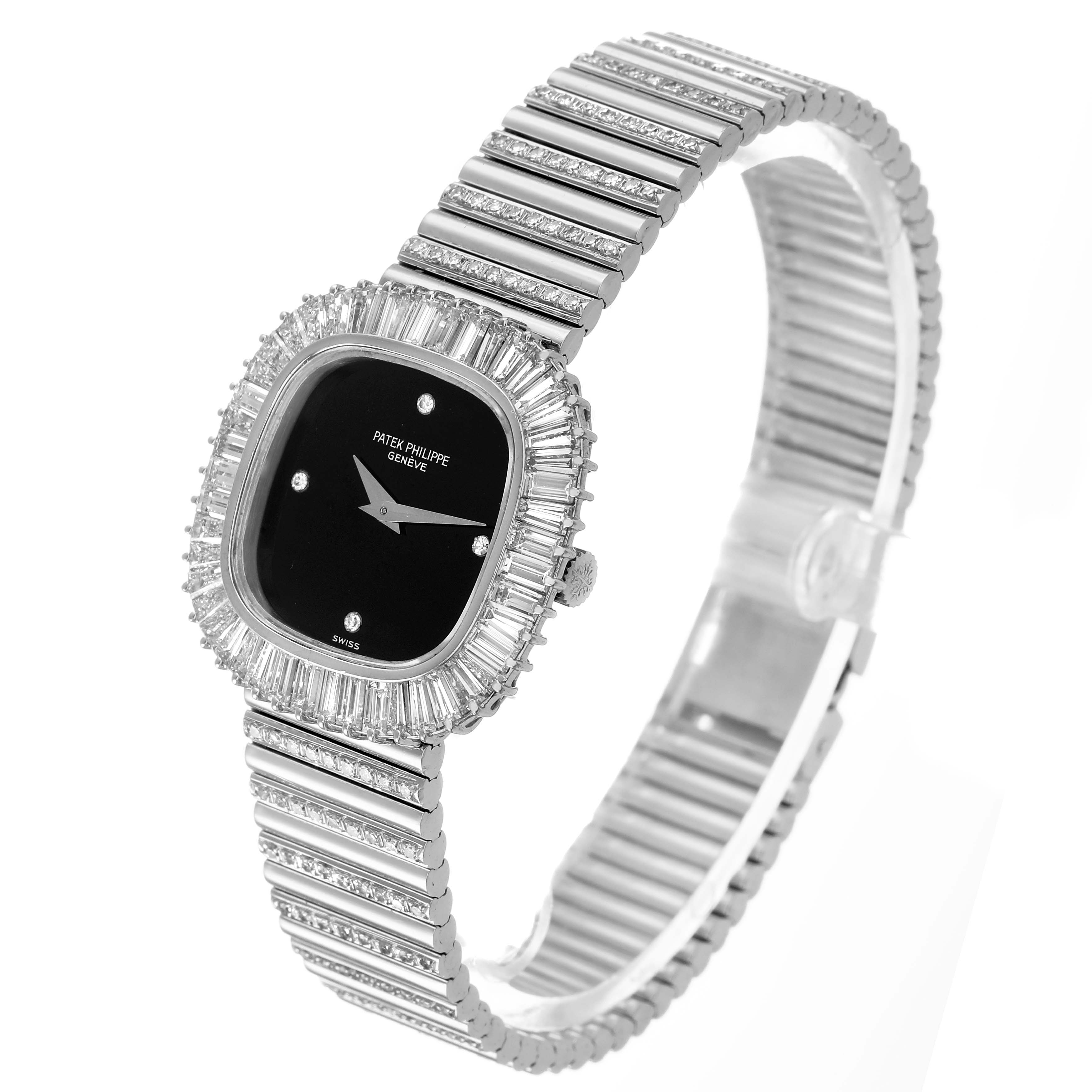 The Patek Philippe Vintage 4432/1 Women's White Gold Black Dial watch is shown at a side angle, displaying its diamond-encrusted bezel, black dial, and metallic bracelet.