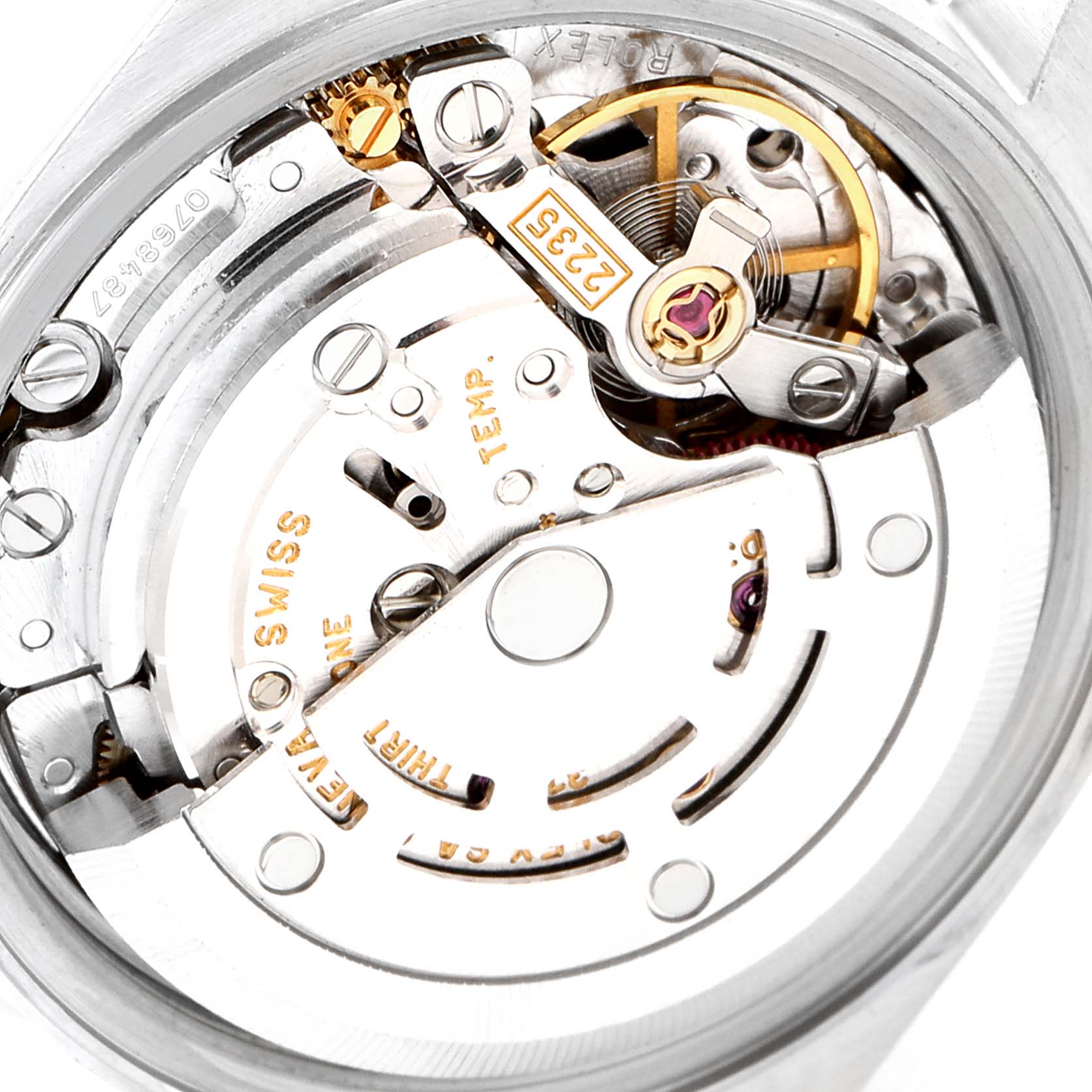 The image shows a close-up view of the movement mechanism inside the Rolex Date 79160 Women's Stainless Steel White Dial 79160 Women's Stainless Steel White Dial model watch, highlighting gears and components.