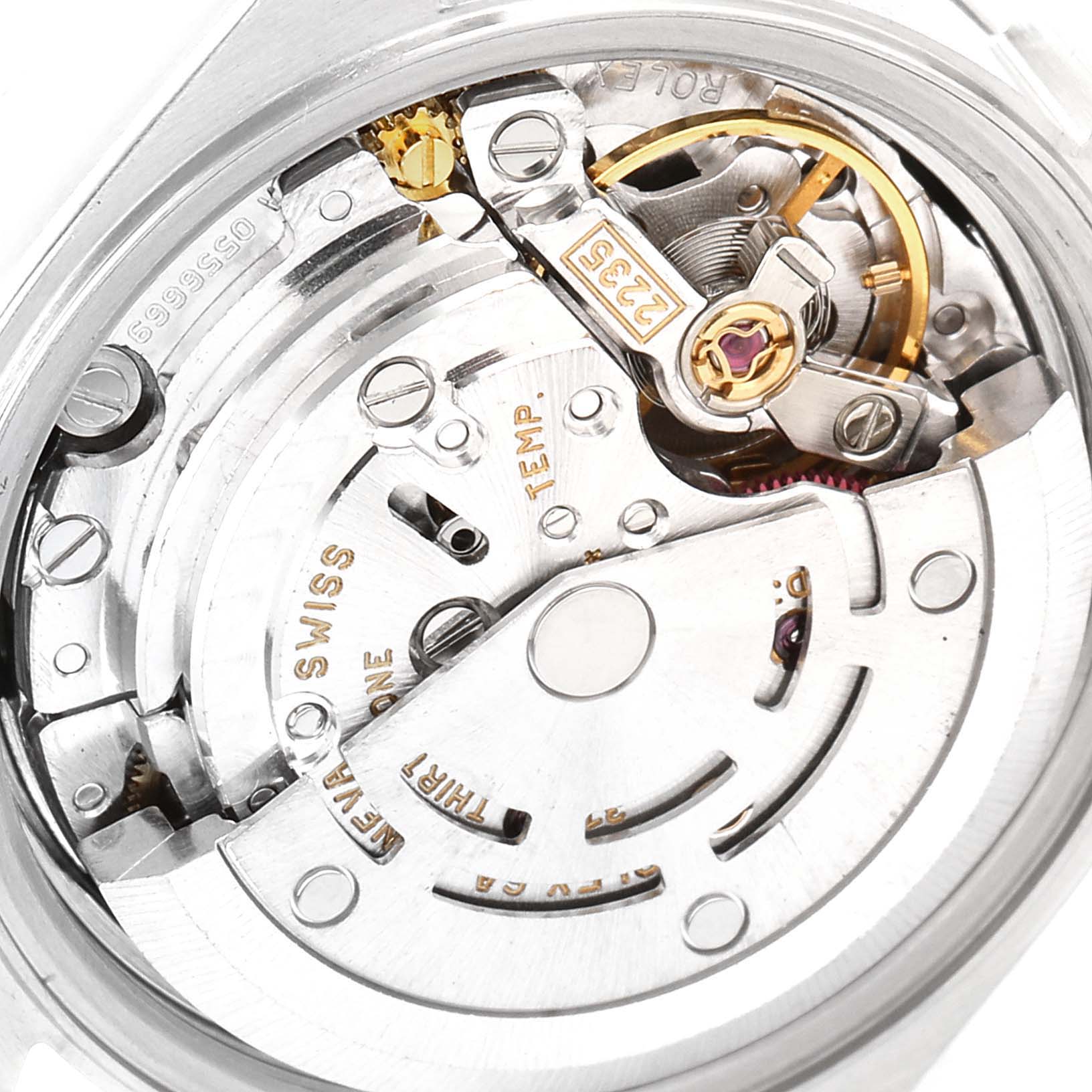 This image shows a close-up view of the movement and internal mechanisms of a Rolex Date 79190 Women
s Stainless Steel Black Dial 79190 Women
s Stainless Steel Black Dial model watch.