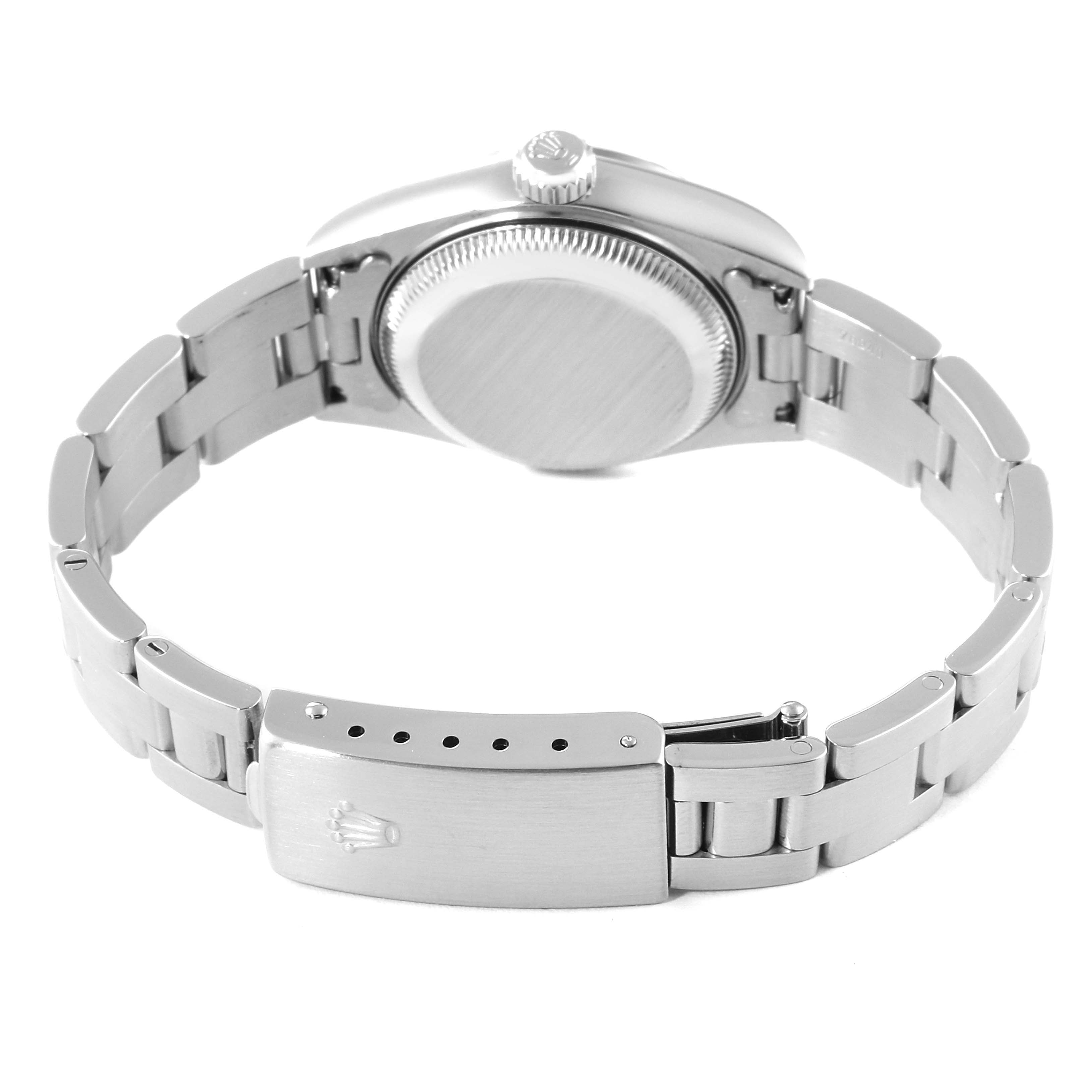 The image shows the back and clasp of a Rolex Date 79190 Women
s Stainless Steel Black Dial 79190 Women
s Stainless Steel Black Dial model watch, focusing on its bracelet and case back.