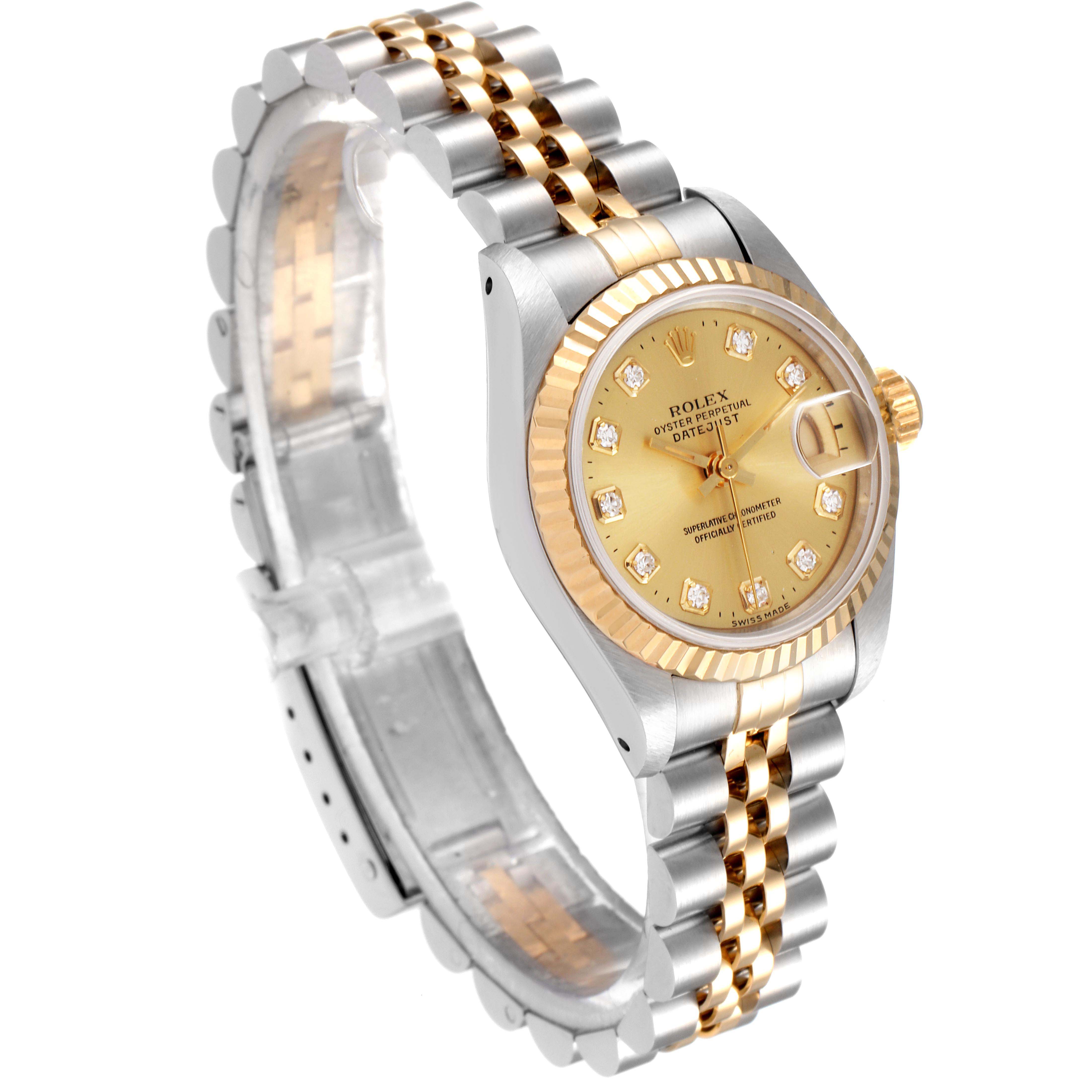 The image shows a Rolex Datejust 69173 Women's Steel and Gold (two tone) Champagne Dial 69173 Women's Steel and Gold (two tone) Champagne Dial watch at an angled view, highlighting its gold and silver bracelet, dial, bezel, and crown.