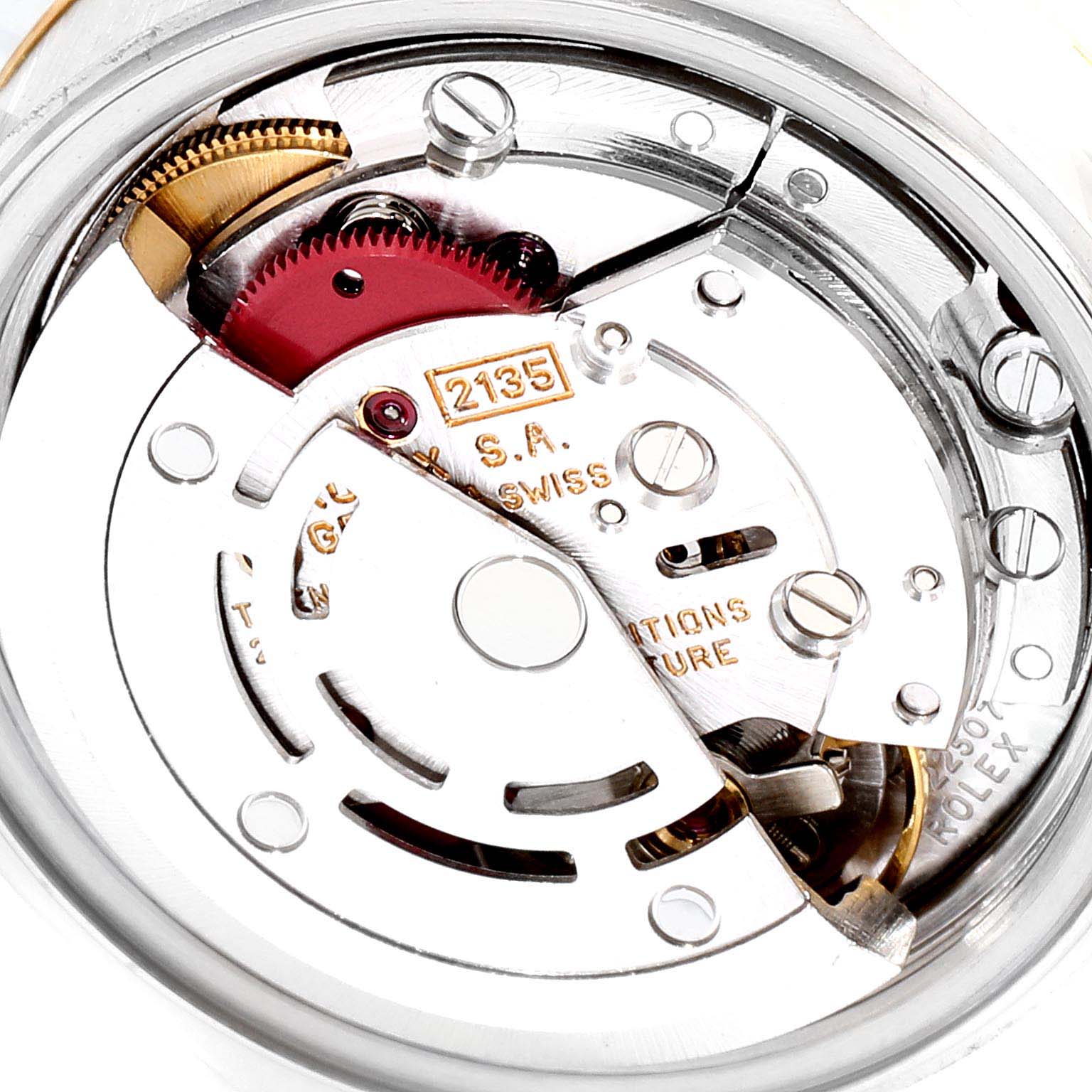 This image shows the intricate movement mechanism of a Rolex Datejust 69173 Women's Steel and Gold (two tone) Champagne Dial 69173 Women's Steel and Gold (two tone) Champagne Dial watch, including its caliber 3135 components.