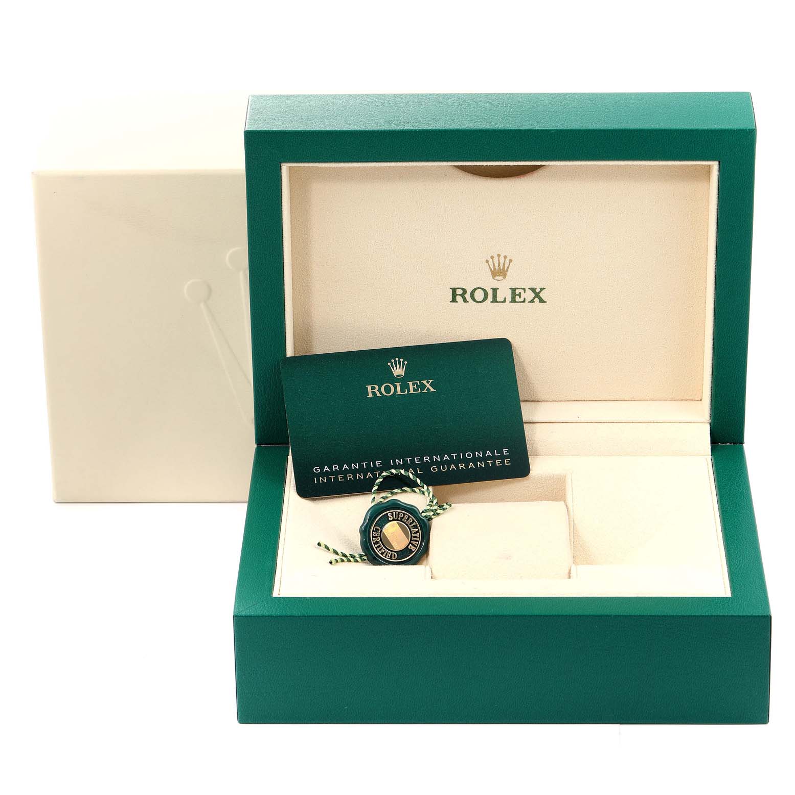 The image shows the open box for a Rolex Datejust 126200 Men
s Stainless Steel Black Dial 126200 Men
s Stainless Steel Black Dial with the warranty card and a tag inside.