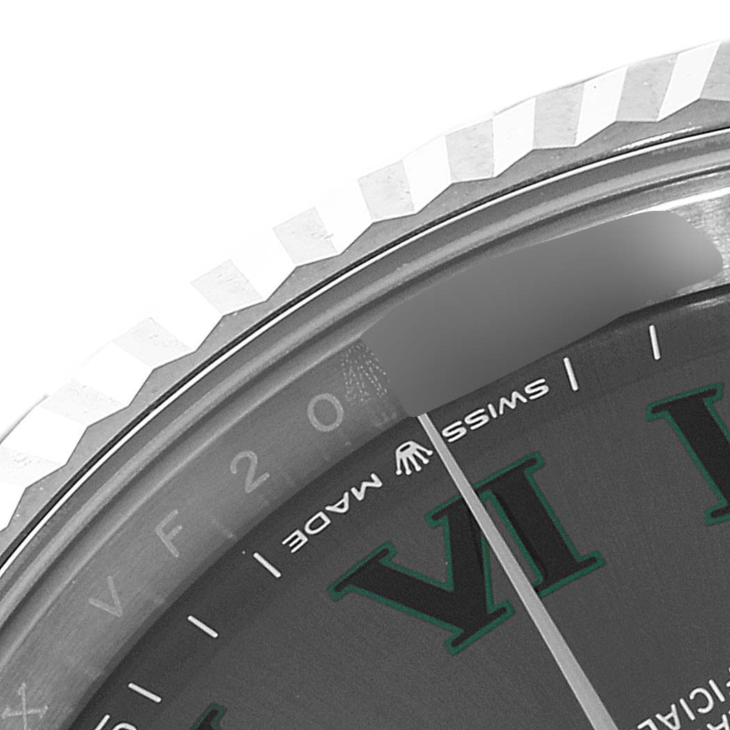 This close-up image of a Rolex Datejust 41 126334 Men
s Stainless Steel Grey Dial 126334 Men
s Stainless Steel Grey Dial watch shows part of the bezel, dial, and the "Swiss Made" text.