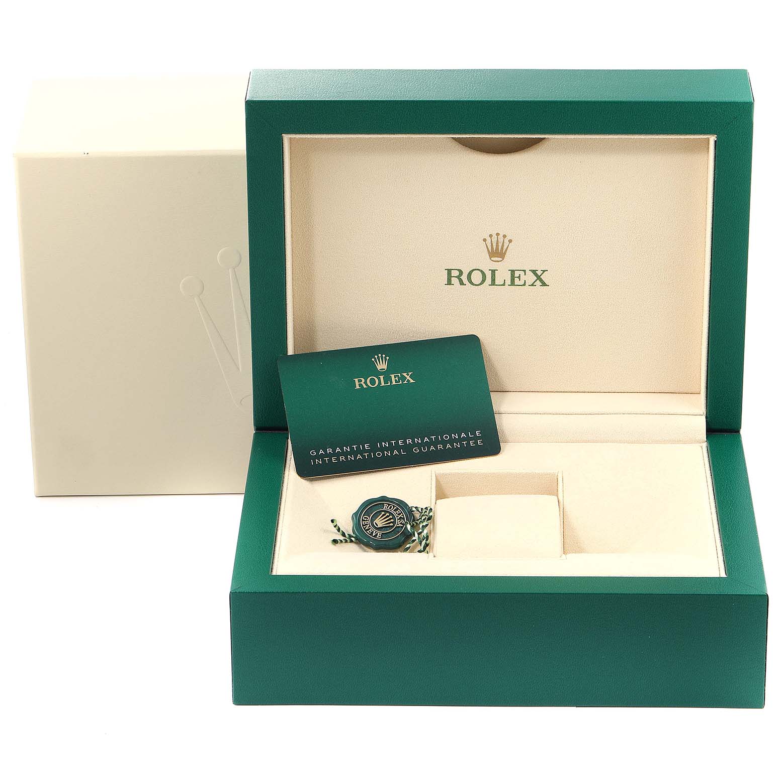 The image shows the open box of a Rolex Datejust 41 126334 Men
s Stainless Steel Grey Dial 126334 Men
s Stainless Steel Grey Dial, with the international guarantee and a tag visible.