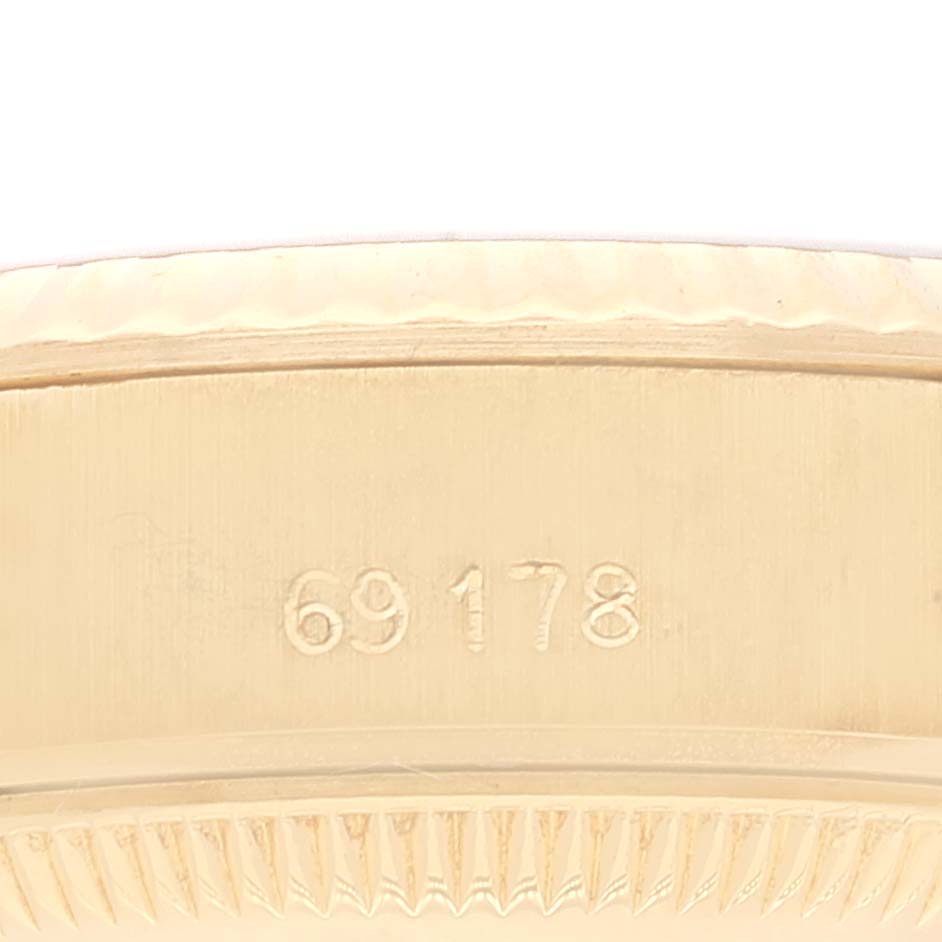 This close-up image shows the case and model number "69178" of a Rolex President 69178 Women's Yellow Gold Champagne Dial 69178 Women's Yellow Gold Champagne Dial watch.