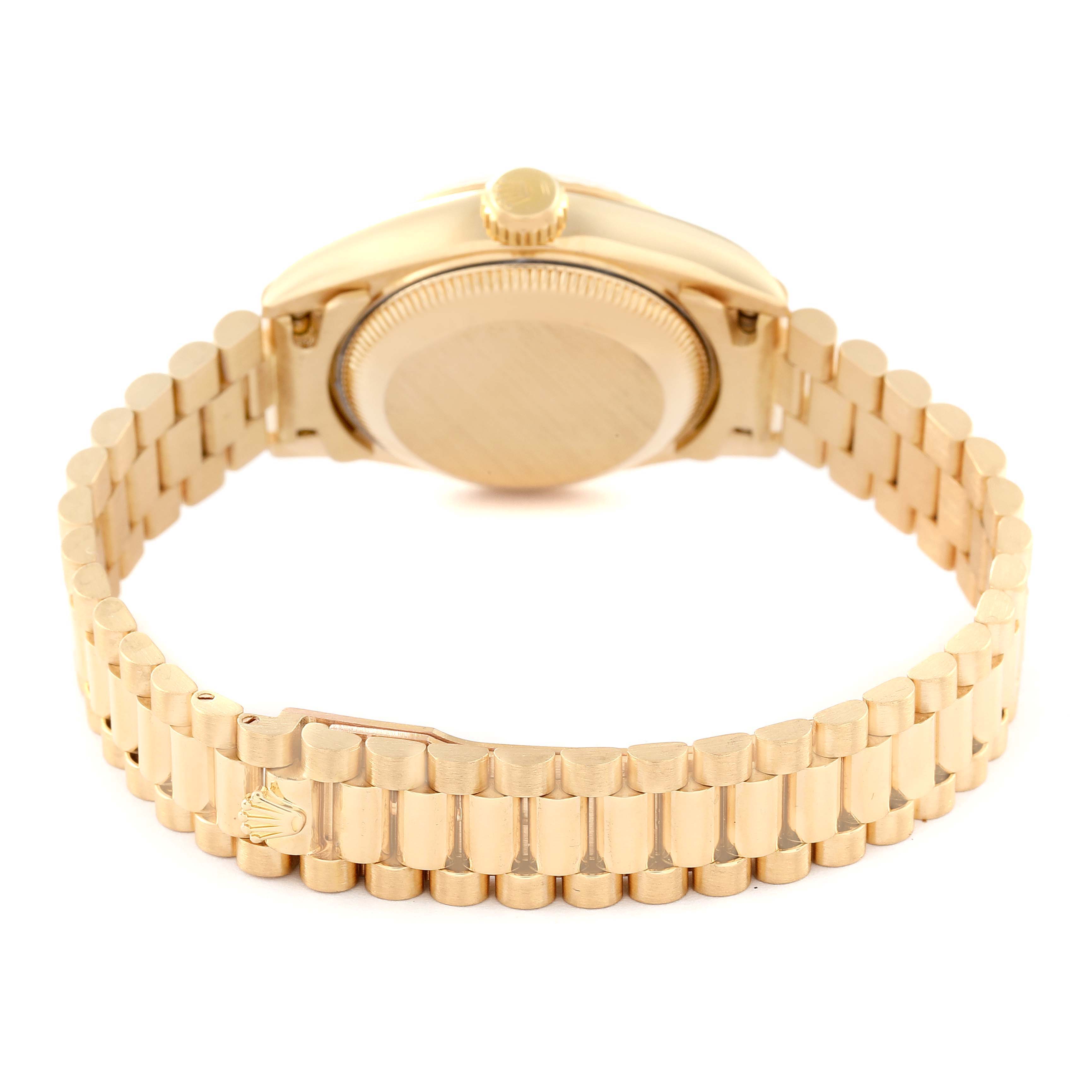The image shows the back casing and bracelet of a Rolex President 69178 Women's Yellow Gold Champagne Dial 69178 Women's Yellow Gold Champagne Dial model watch at an angle.