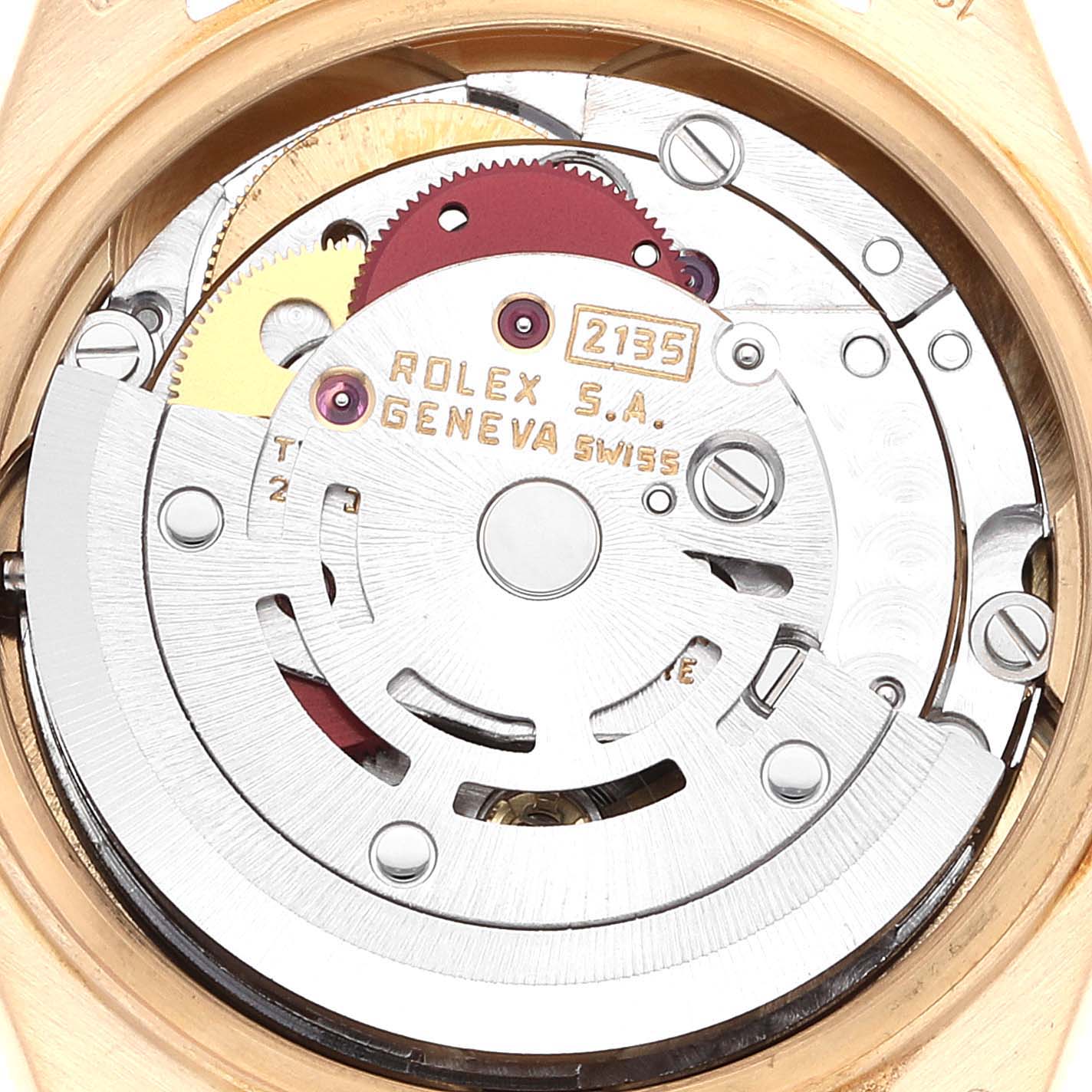 The image shows the inner mechanism of a Rolex President 69178 Women's Yellow Gold Champagne Dial 69178 Women's Yellow Gold Champagne Dial model watch, highlighting its gears and movement parts.