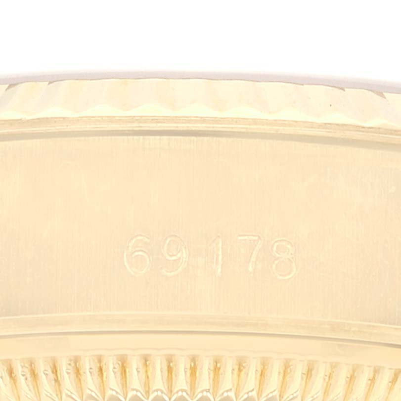 The image shows a close-up angle of the bezel and case of a Rolex President 69178 Women's Yellow Gold Champagne Dial 69178 Women's Yellow Gold Champagne Dial model watch, displaying the model number 69178.