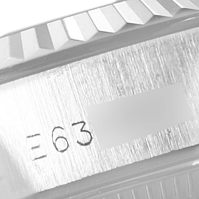 This image shows a close-up angle of the case side and serial number of a Rolex Datejust 69174 Women
s Stainless Steel Silver Dial 69174 Women
s Stainless Steel Silver Dial watch.