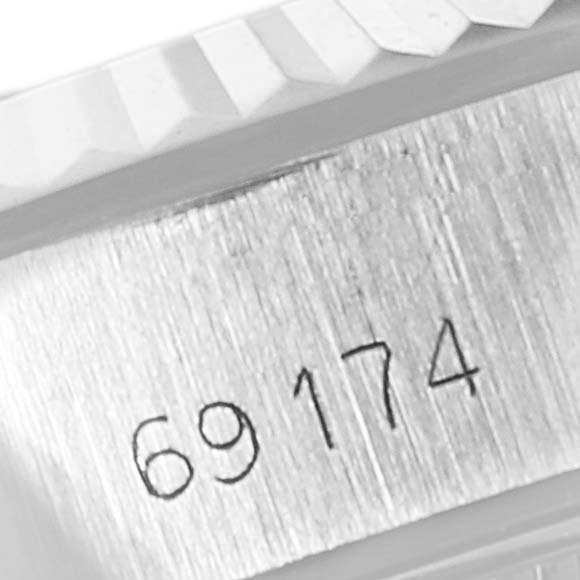 This image shows a close-up of the model number "69174" on the case side of a Rolex Datejust 69174 Women
s Stainless Steel Silver Dial 69174 Women
s Stainless Steel Silver Dial watch.