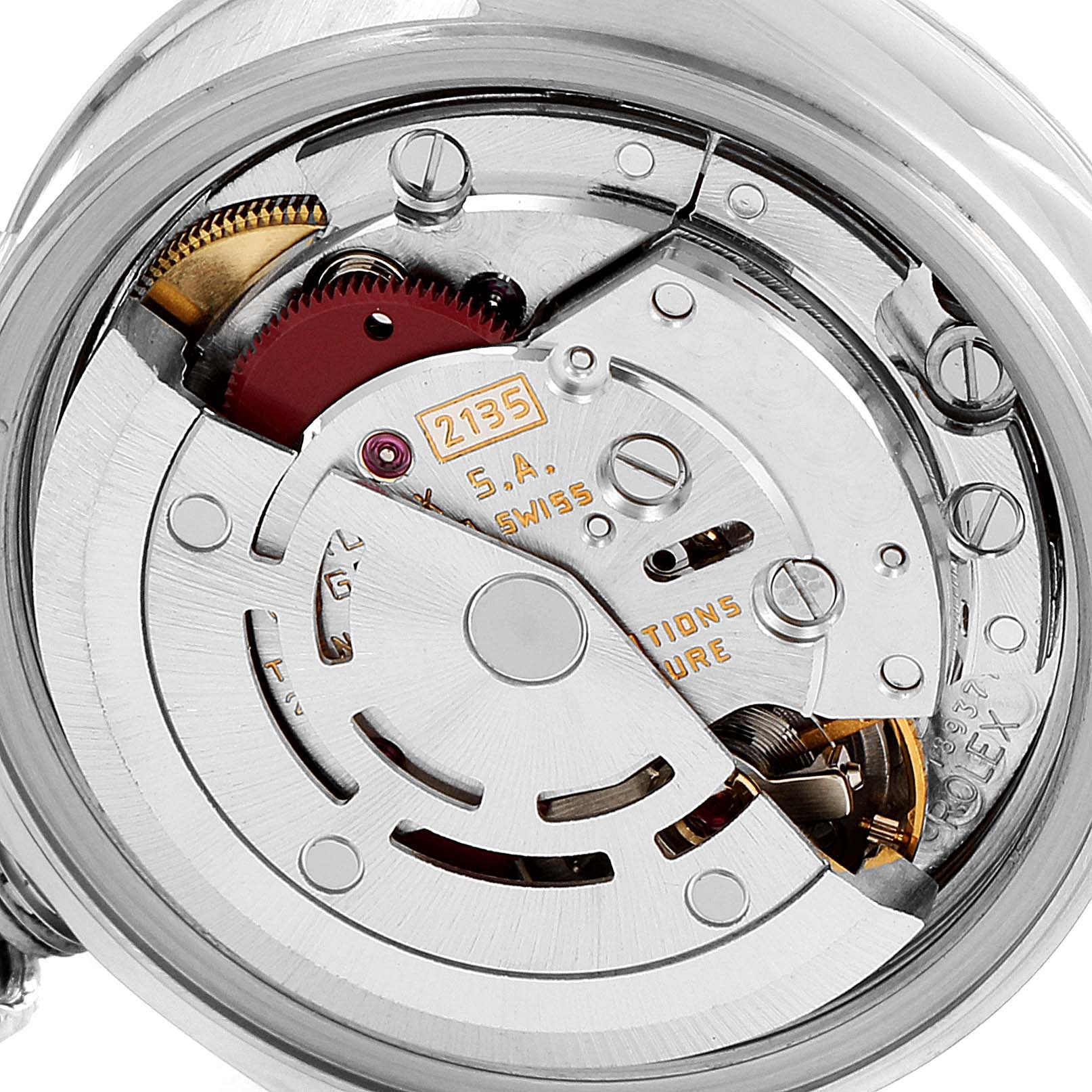 This image shows the back of a Rolex Datejust 69174 Women
s Stainless Steel Silver Dial 69174 Women
s Stainless Steel Silver Dial, revealing its mechanical movement and intricate components.