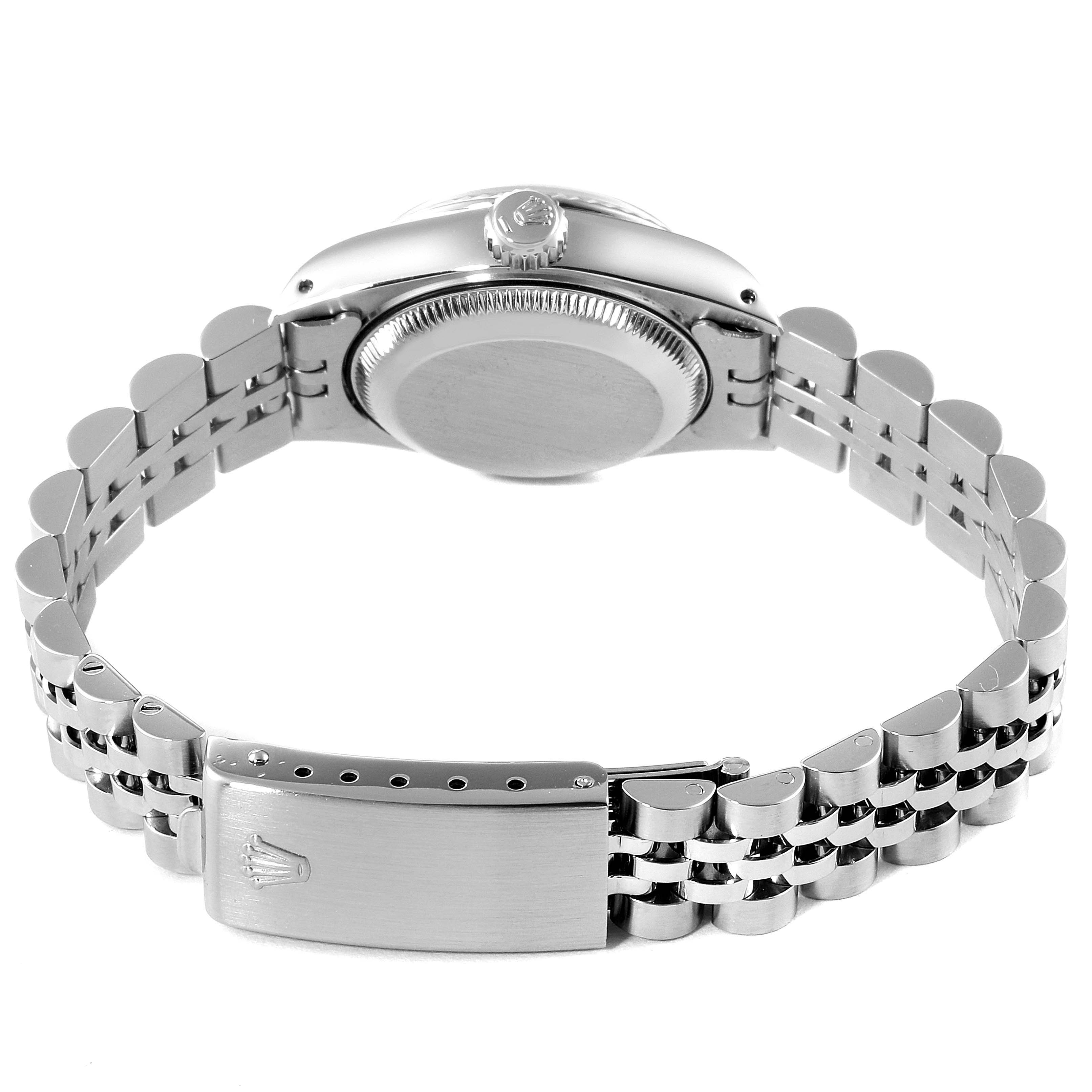 The image shows the back view of a Rolex Datejust 69174 Women
s Stainless Steel Silver Dial 69174 Women
s Stainless Steel Silver Dial watch, displaying its clasp, bracelet, and case back.
