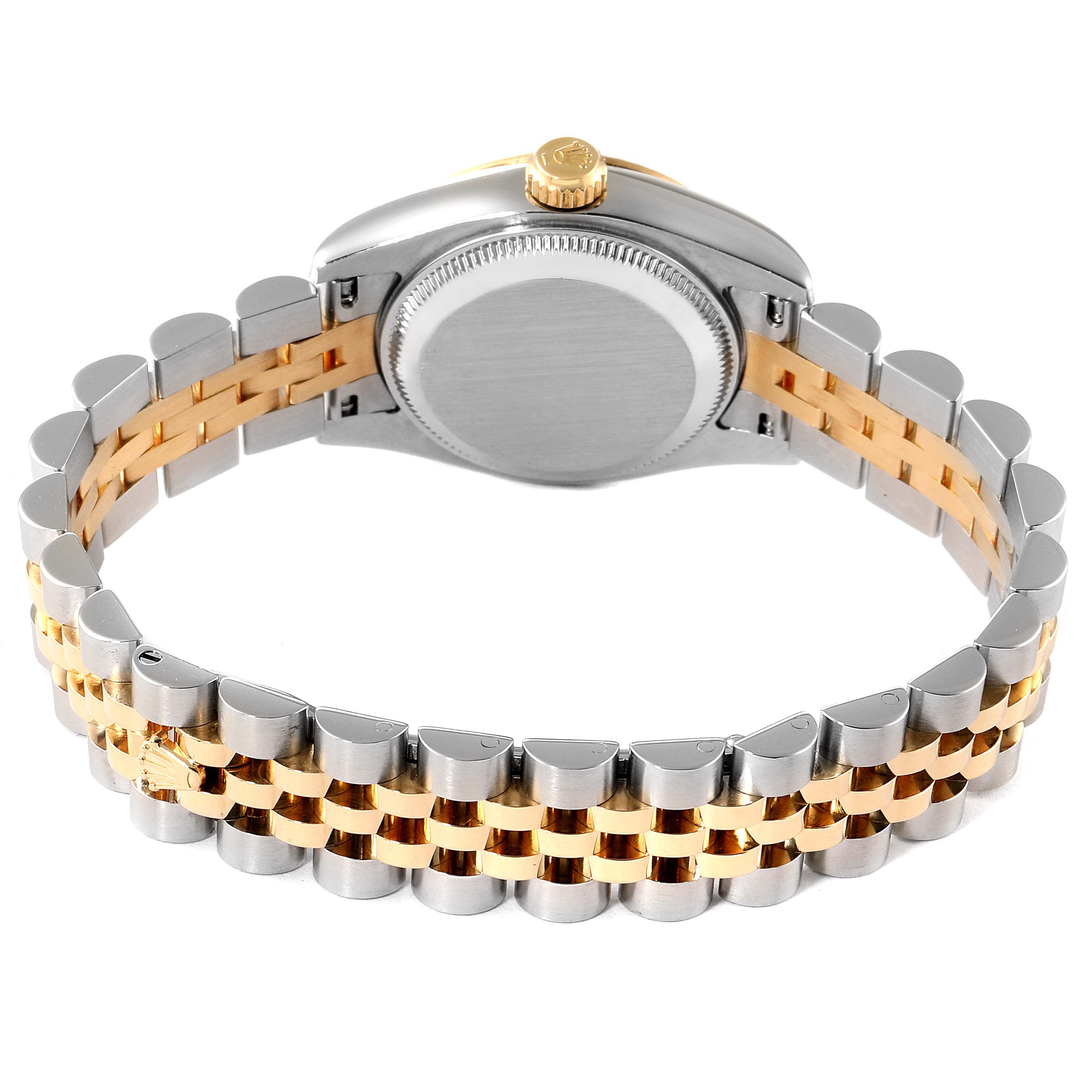 The image shows the back view of a Rolex Datejust 179173 Women's Steel and Gold (two tone) Black Dial 179173 Women's Steel and Gold (two tone) Black Dial watch, highlighting the case back, crown, and two-tone bracelet.