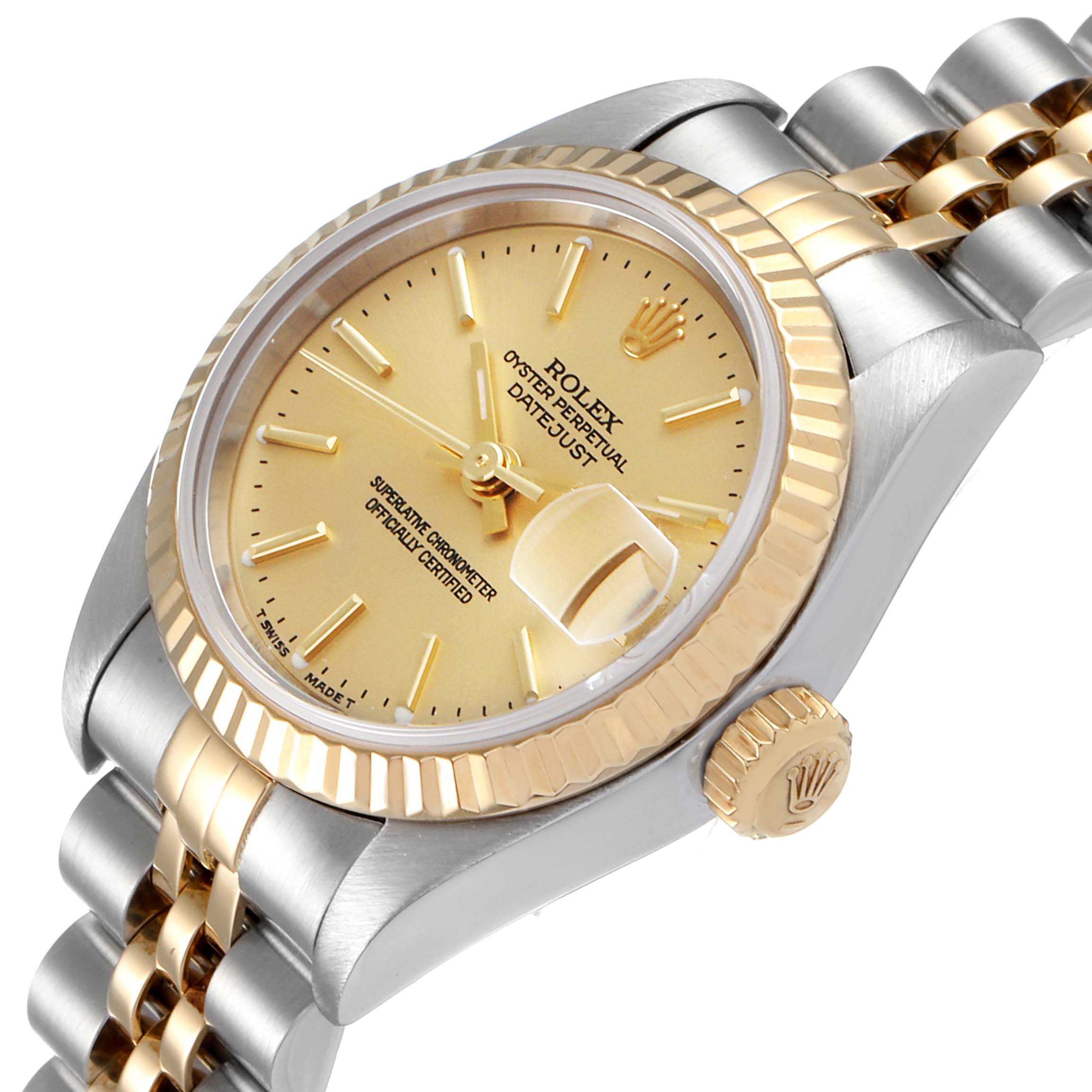The image shows a Rolex Datejust 79173 Women's Steel and Gold (two tone) Champagne Dial 79173 Women's Steel and Gold (two tone) Champagne Dial watch angled from the right side, featuring its dial, crown, fluted bezel, and jubilee bracelet.