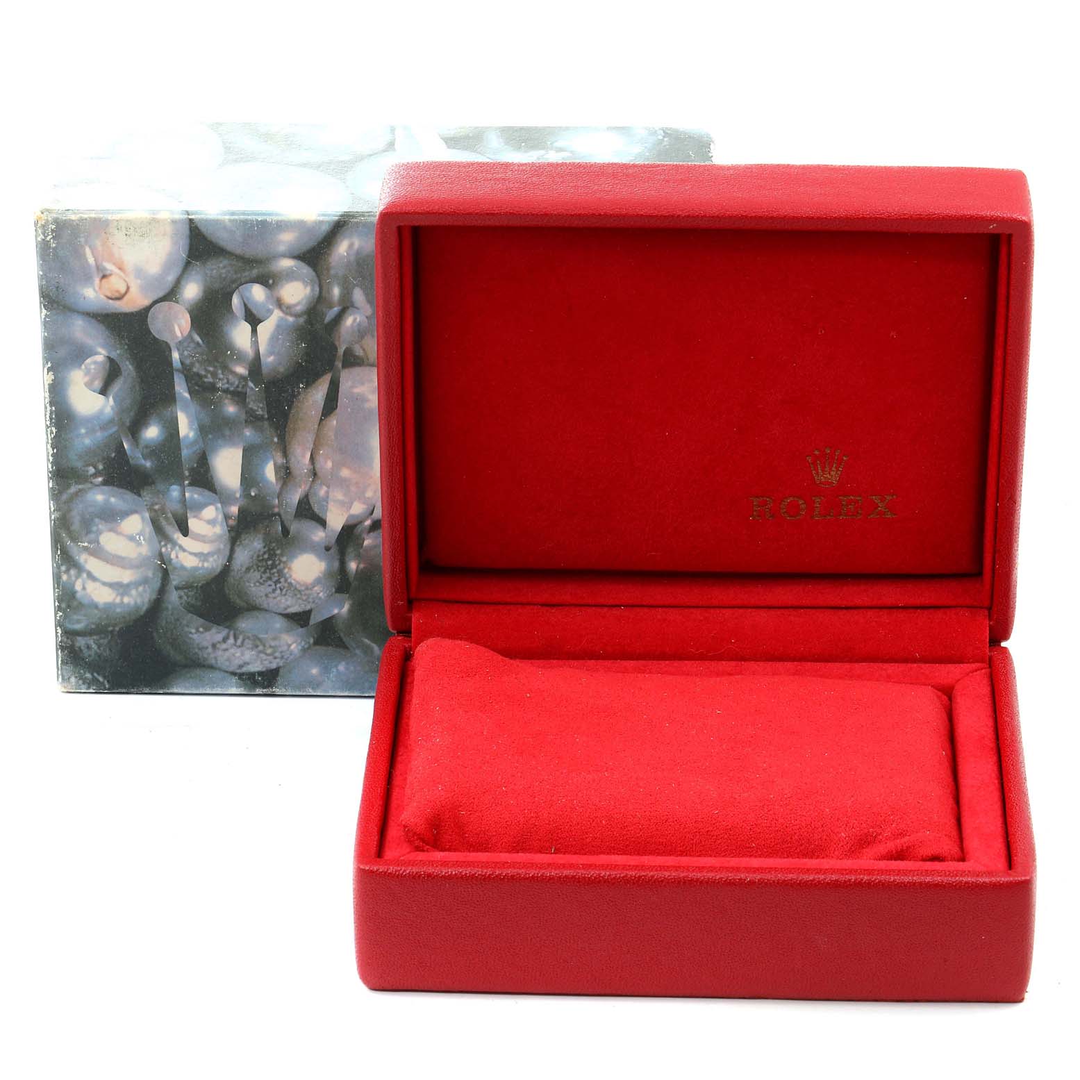 The image shows an open red Rolex box for the Datejust model, revealing a plush interior and the Rolex logo.