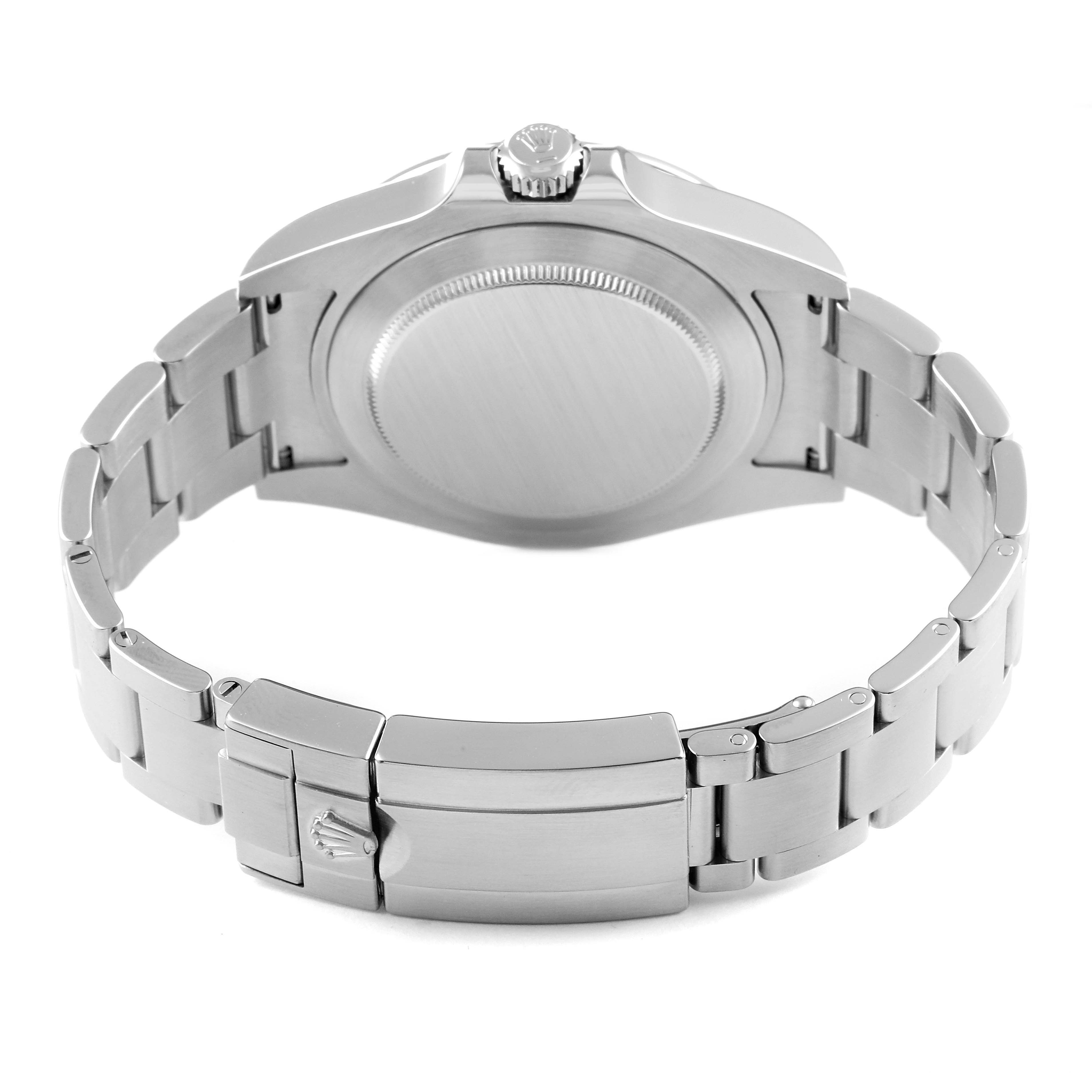 The image shows the back view of a Rolex Explorer 216570 Men
s Stainless Steel Black Dial 216570 Men
s Stainless Steel Black Dial watch, highlighting its closed clasp and bracelet.