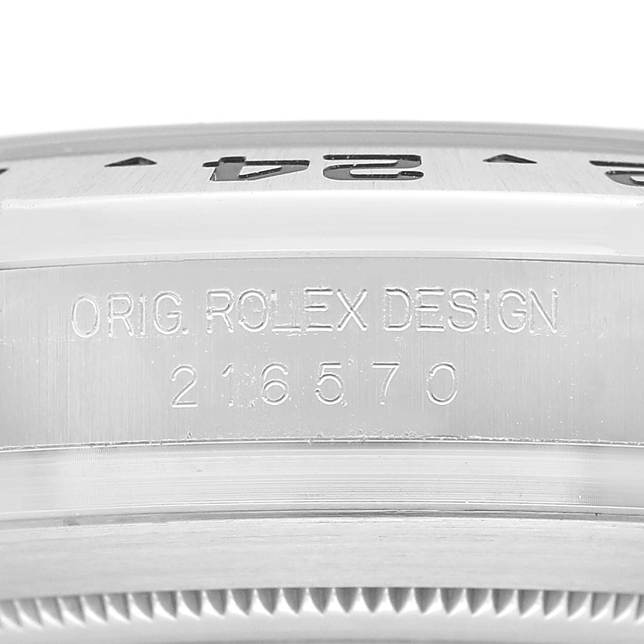 The image shows a close-up side view of the Rolex Explorer 216570 Men's Stainless Steel White Dial watch, highlighting the engraved model number "216570" and "ORIG. ROLEX DESIGN."