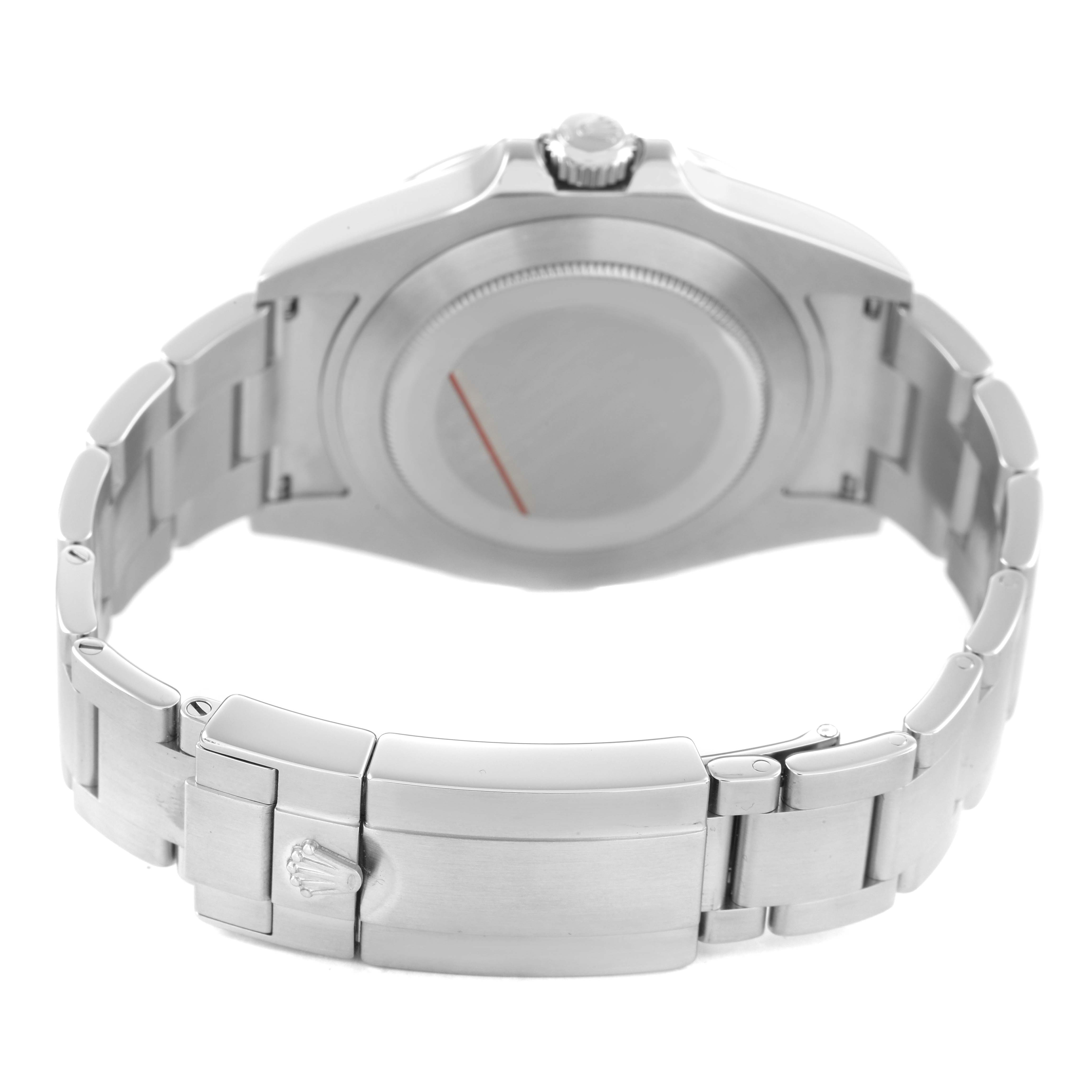 The image shows the backside of the Rolex Explorer 216570 Men's Stainless Steel White Dial watch, highlighting the clasp, bracelet, and case back.