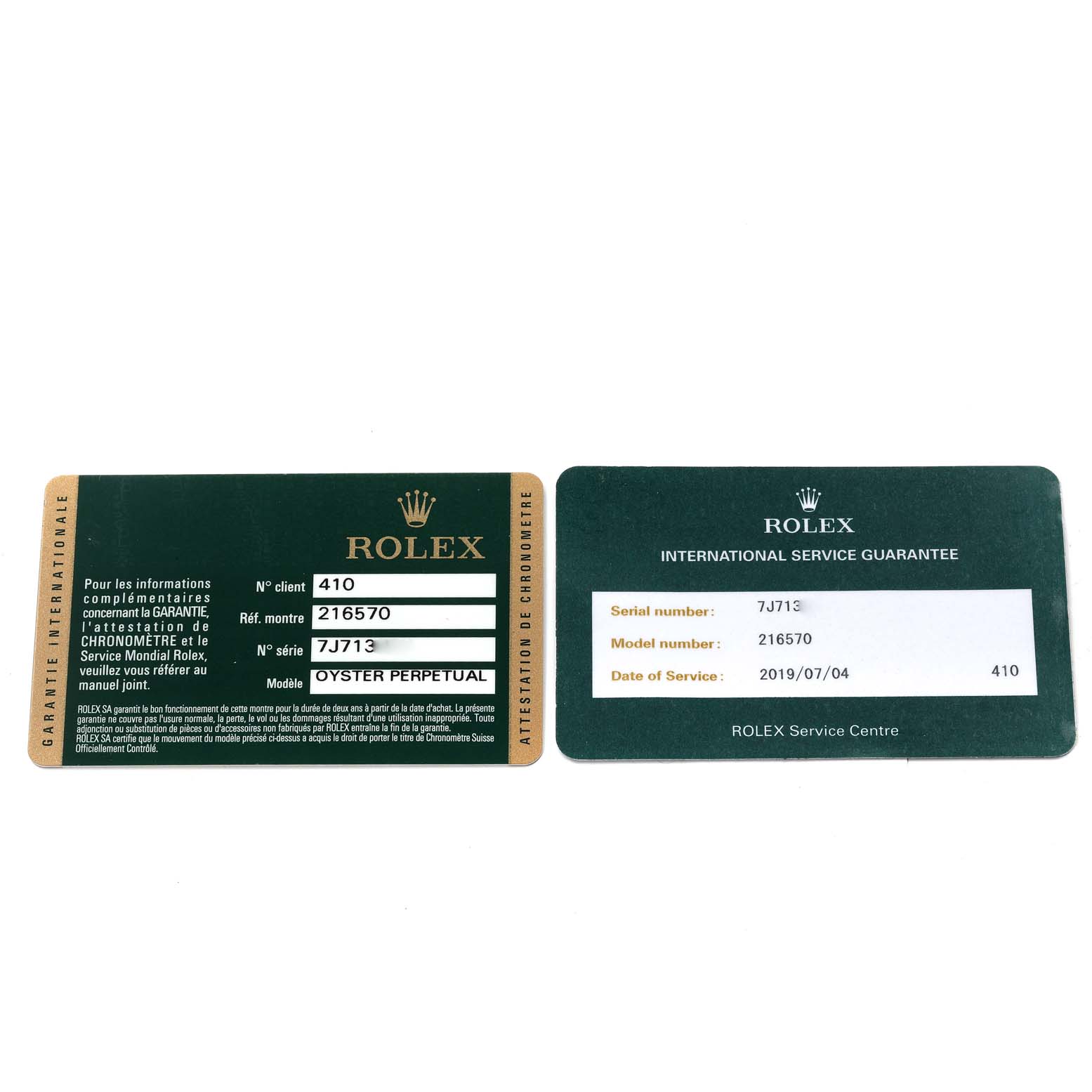 The image shows both the guarantee card and the international service guarantee card for a Rolex Explorer 216570 Men's Stainless Steel Black Dial 216570 Men's Stainless Steel Black Dial model.
