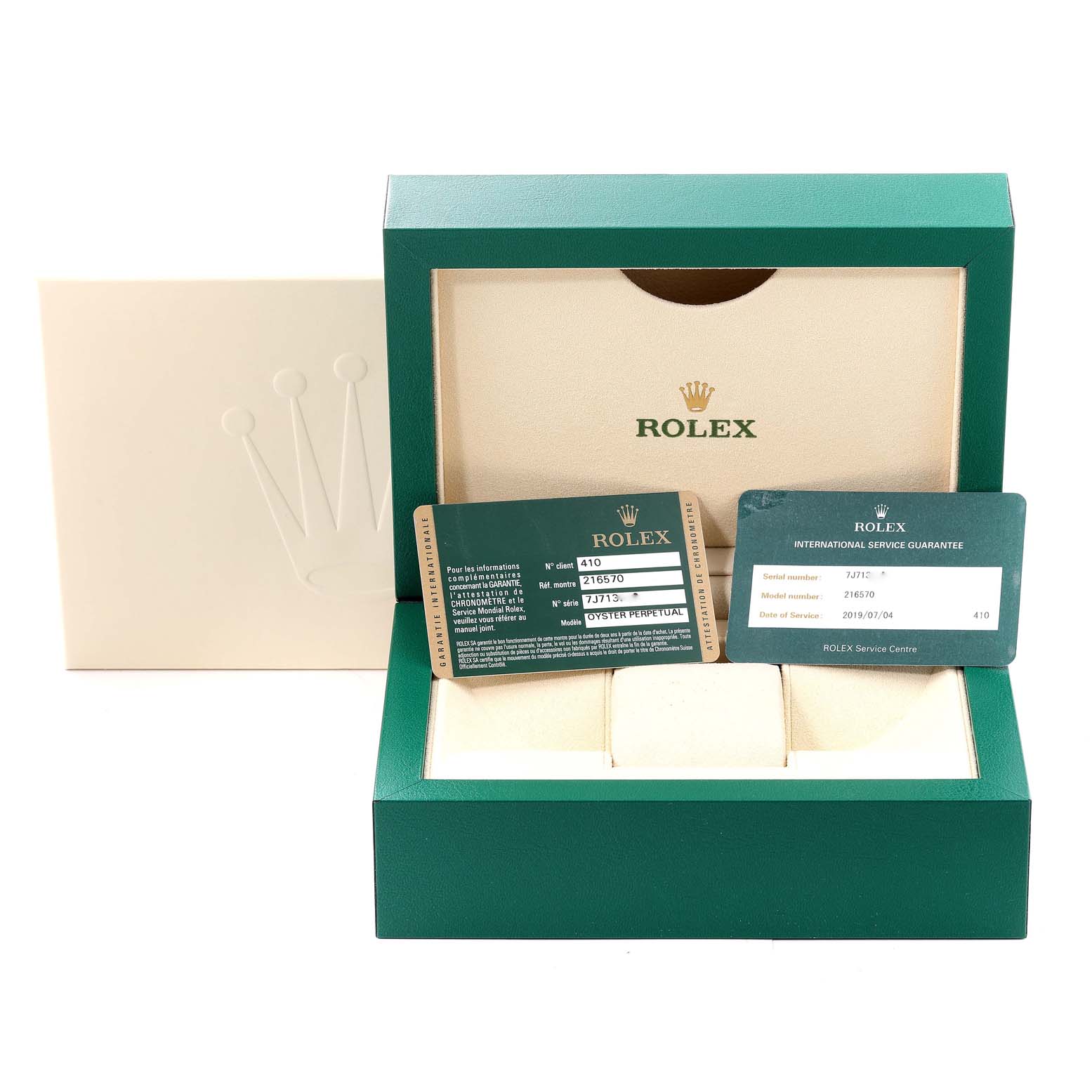 The image shows the Rolex Explorer 216570 Men's Stainless Steel Black Dial 216570 Men's Stainless Steel Black Dial watch's box, service booklet, and warranty card from a front angle.