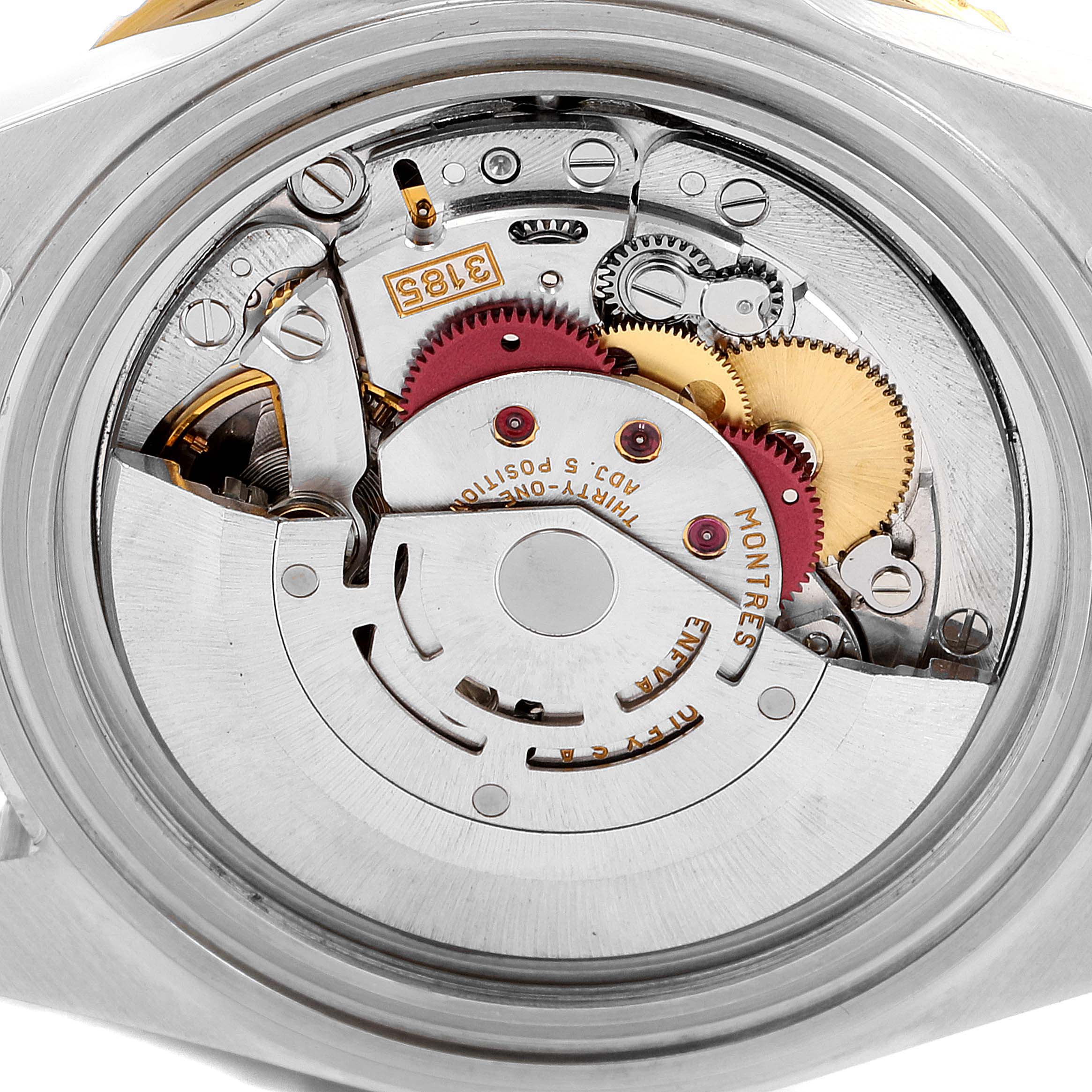 This image shows the movement mechanism of a Rolex GMT-Master 16713 Men's Steel and Gold (two tone) Champagne Dial 16713 Men's Steel and Gold (two tone) Champagne Dial watch from the back angle.