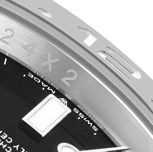 The image shows a close-up of the bezel and dial edge of a Rolex GMT-Master 126710 Men's Stainless Steel Black Dial, highlighting the numerals and markers.