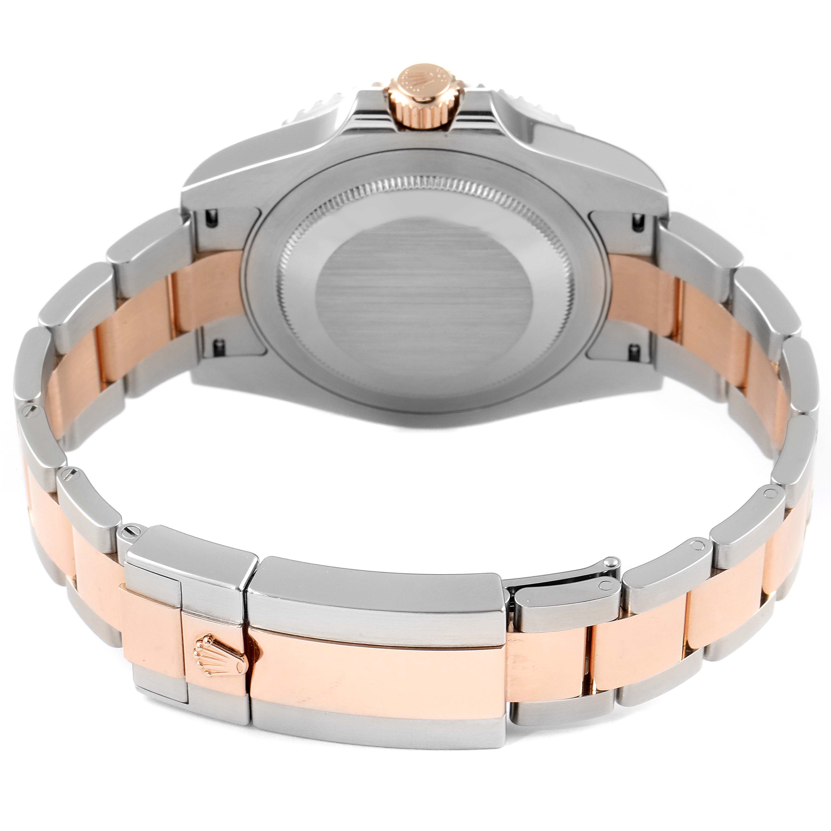 The image shows the back view of a Rolex GMT-Master 126711 Men's Steel and Gold (two tone) Black Dial 126711 Men's Steel and Gold (two tone) Black Dial watch, highlighting the case back and two-tone bracelet.