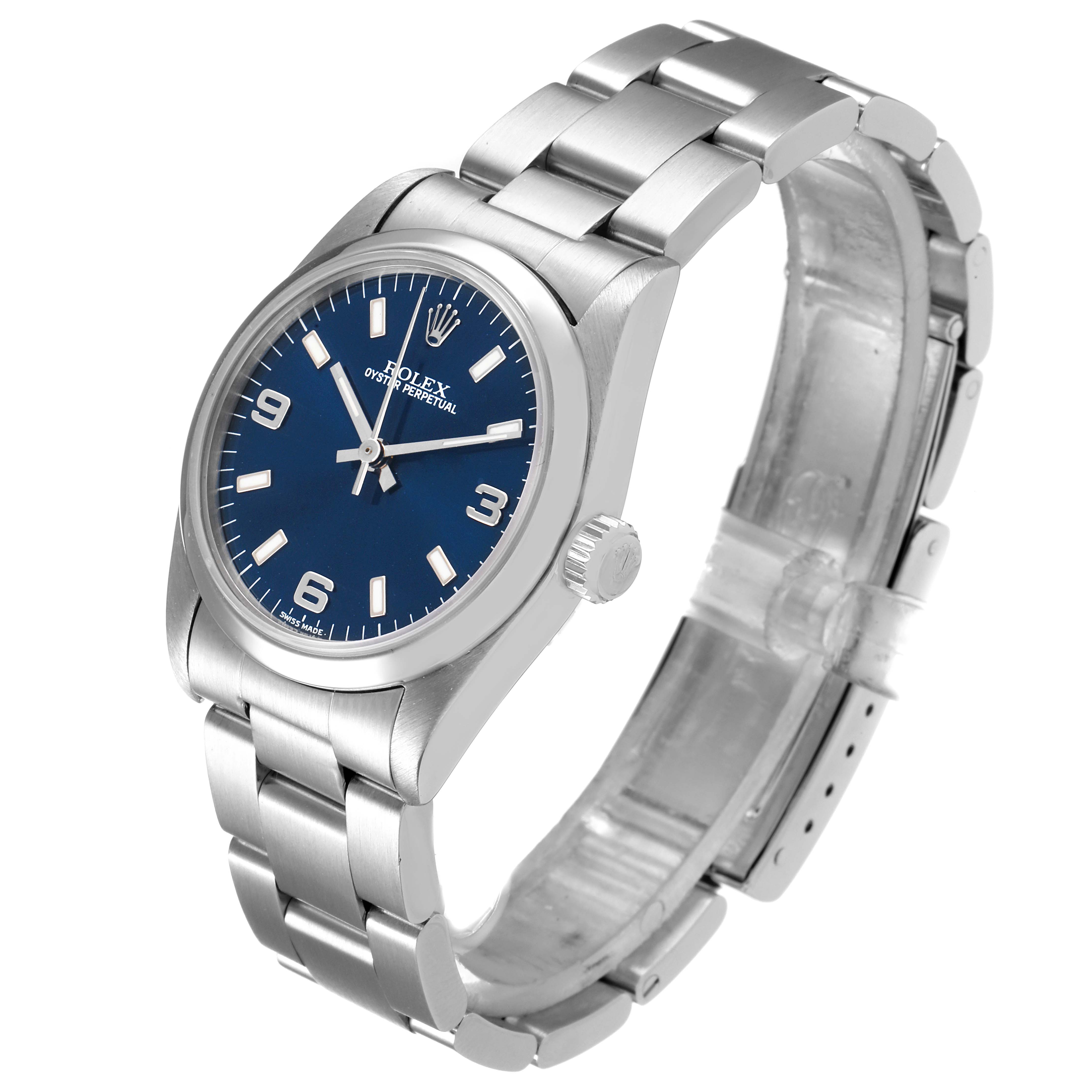 The Rolex Mid-Size 67480 Women
s Stainless Steel Blue Dial 67480 Women
s Stainless Steel Blue Dial model is shown at a three-quarter angle, highlighting the blue dial, bracelet, and crown.