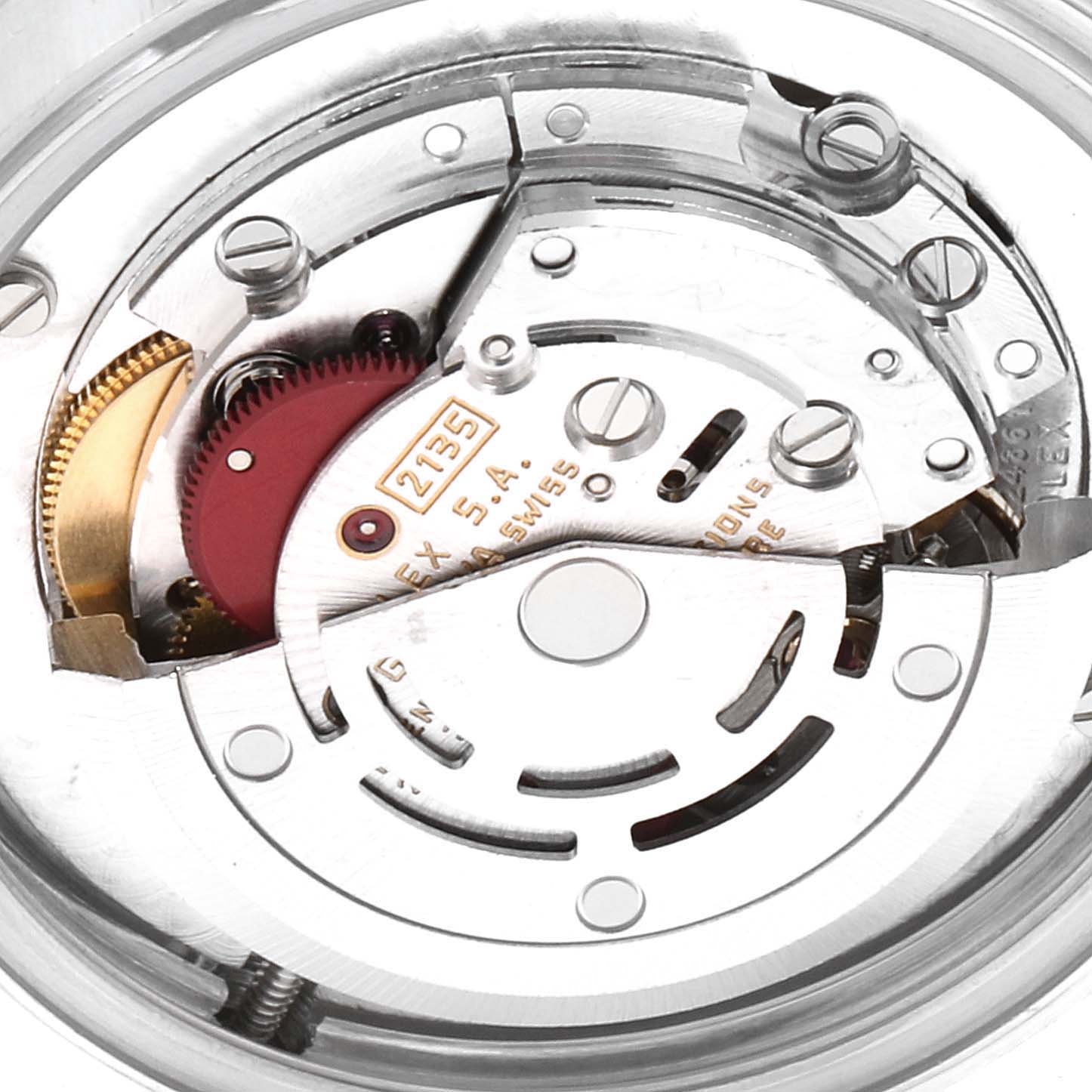 This image shows an internal view of the movement mechanism of a Mid-Size Rolex watch, focusing on the intricate parts and gears.