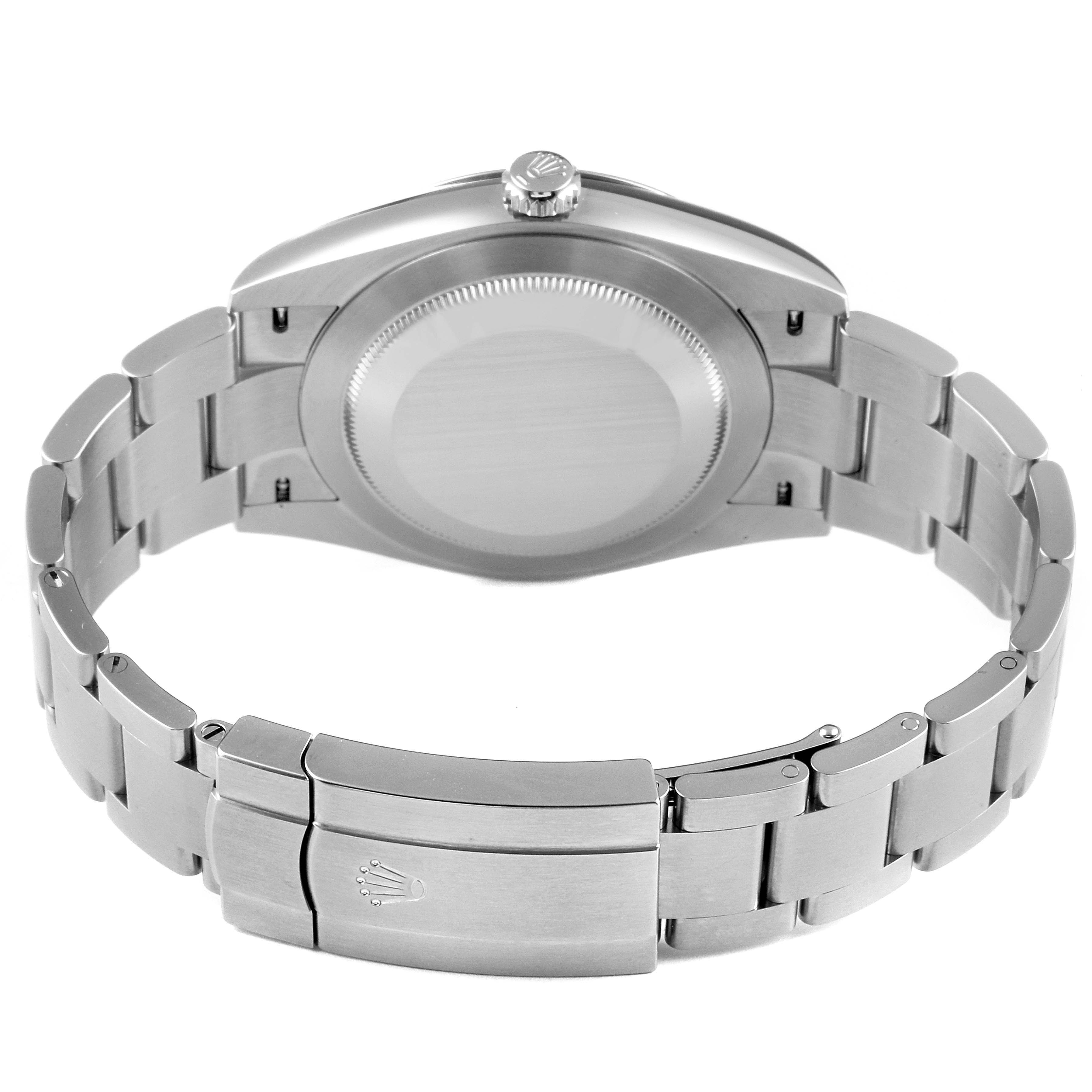 This image shows the back view of a Rolex Oyster Perpetual 124300 Men
s Stainless Steel Green Dial 124300 Men
s Stainless Steel Green Dial watch, highlighting its clasp and bracelet.