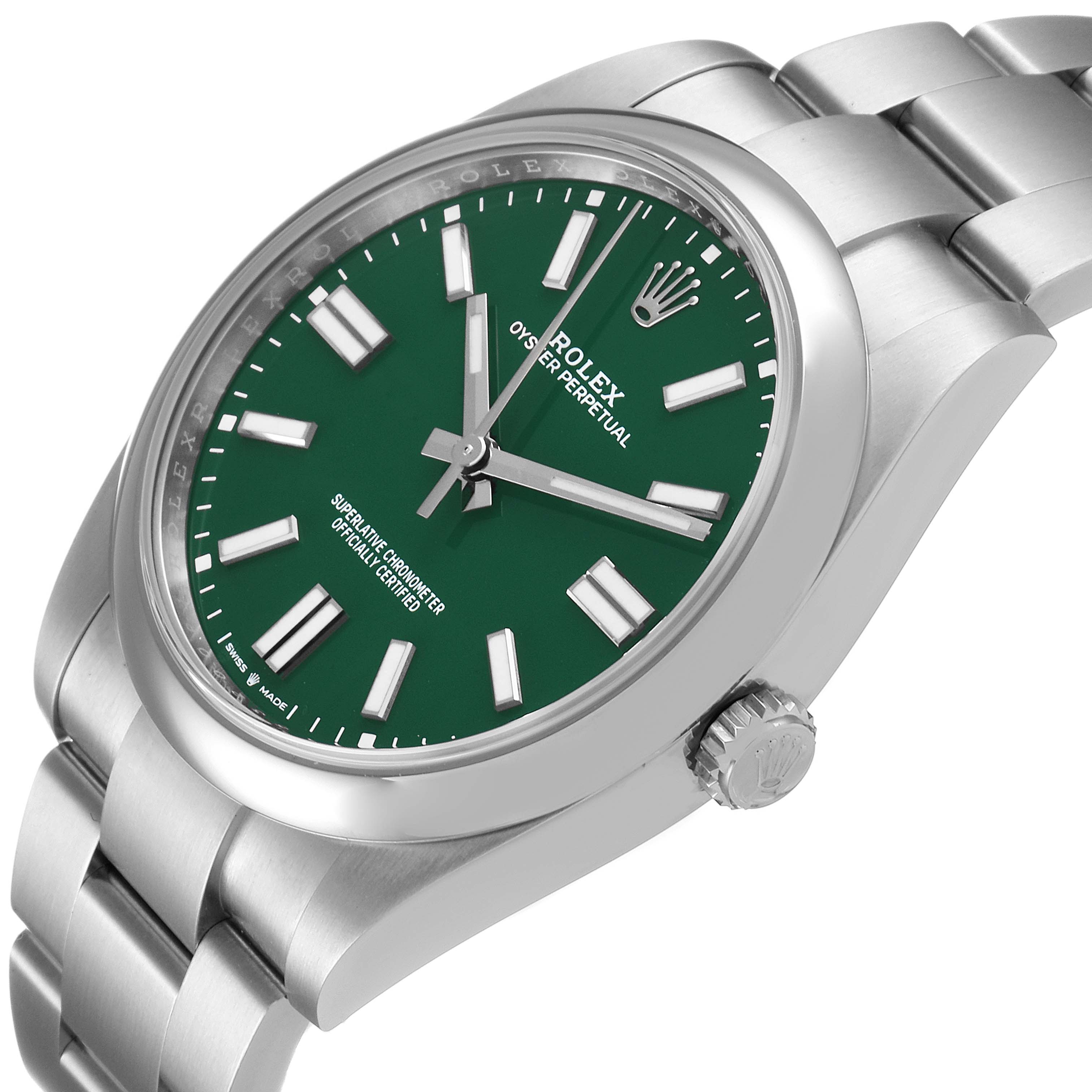 The image shows a side angle of a Rolex Oyster Perpetual 124300 Men
s Stainless Steel Green Dial 124300 Men
s Stainless Steel Green Dial, highlighting its green dial, crown, and part of the bracelet.