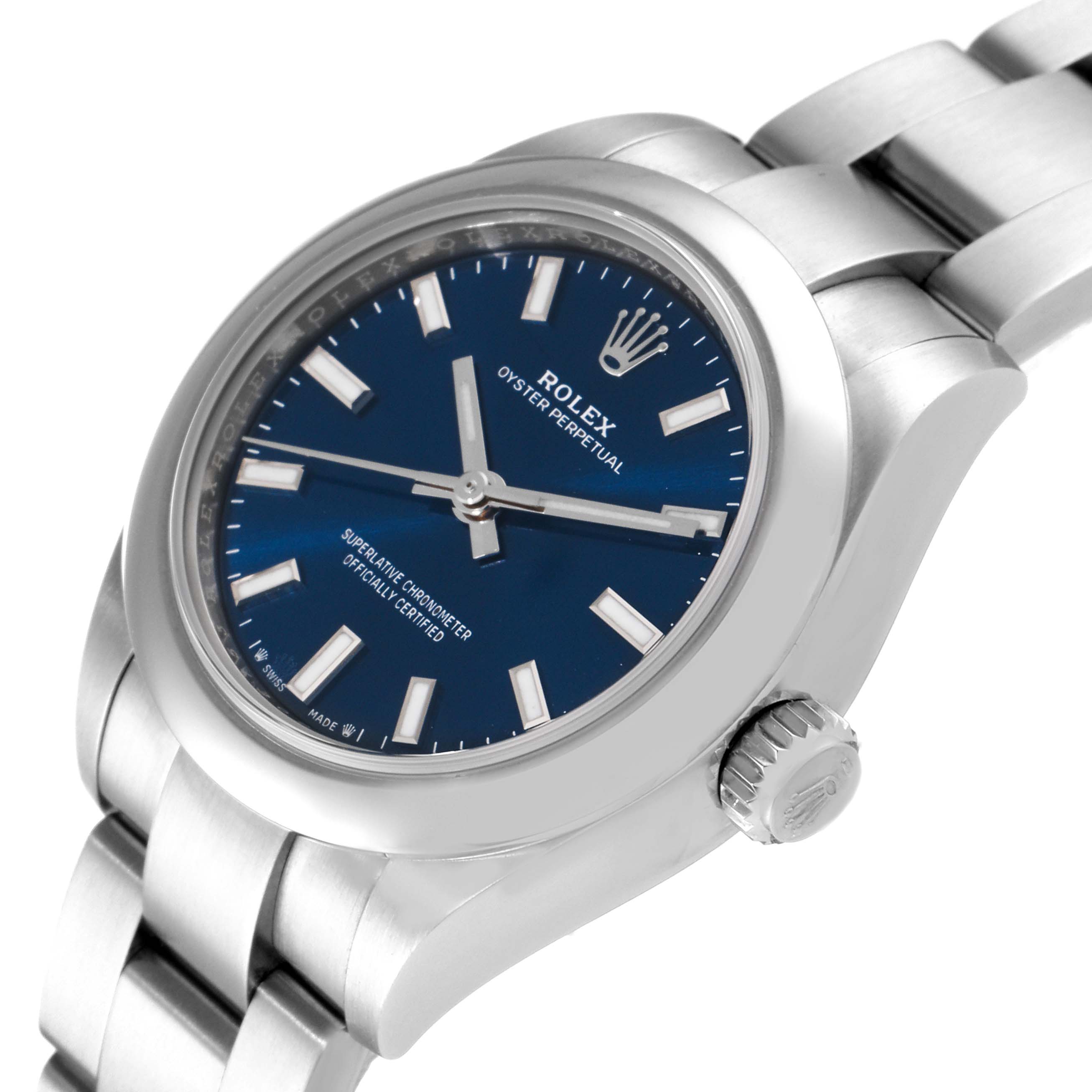 The image shows a side and slightly angled view of the Rolex Oyster Perpetual 276200 Women's Stainless Steel Blue Dial 276200 Women's Stainless Steel Blue Dial with a blue dial and a stainless steel bracelet.