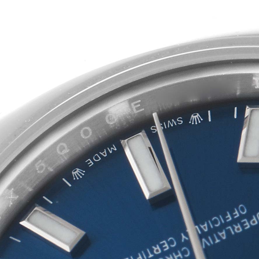 This is a close-up of the Rolex Oyster Perpetual 276200 Women's Stainless Steel Blue Dial 276200 Women's Stainless Steel Blue Dial watch dial, showing the hour markers, hands, and Swiss Made text.