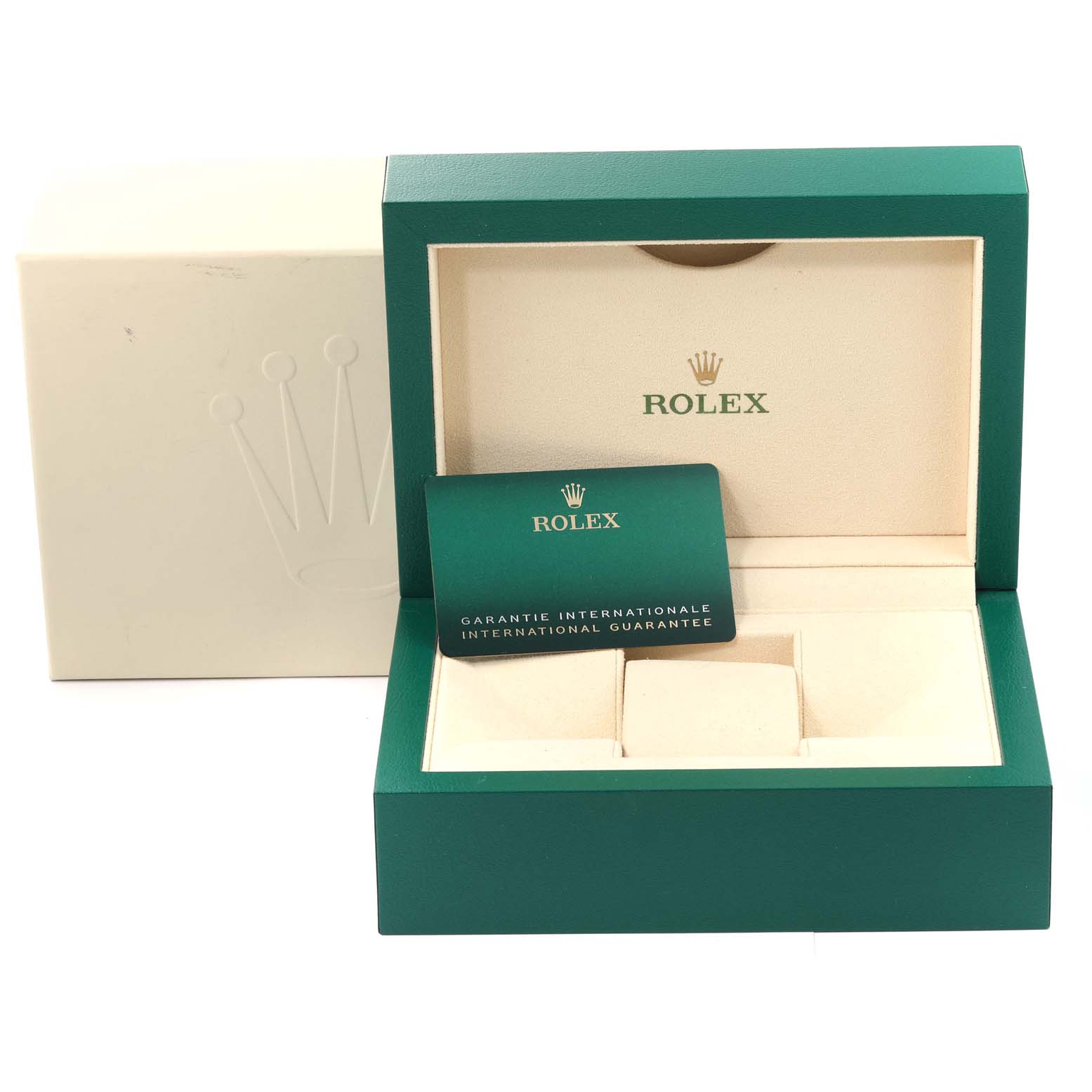 This image shows the packaging for a Rolex Oyster Perpetual 114300 Men's Stainless Steel Silver Dial 114300 Men's Stainless Steel Silver Dial, including the green box and the international guarantee card.