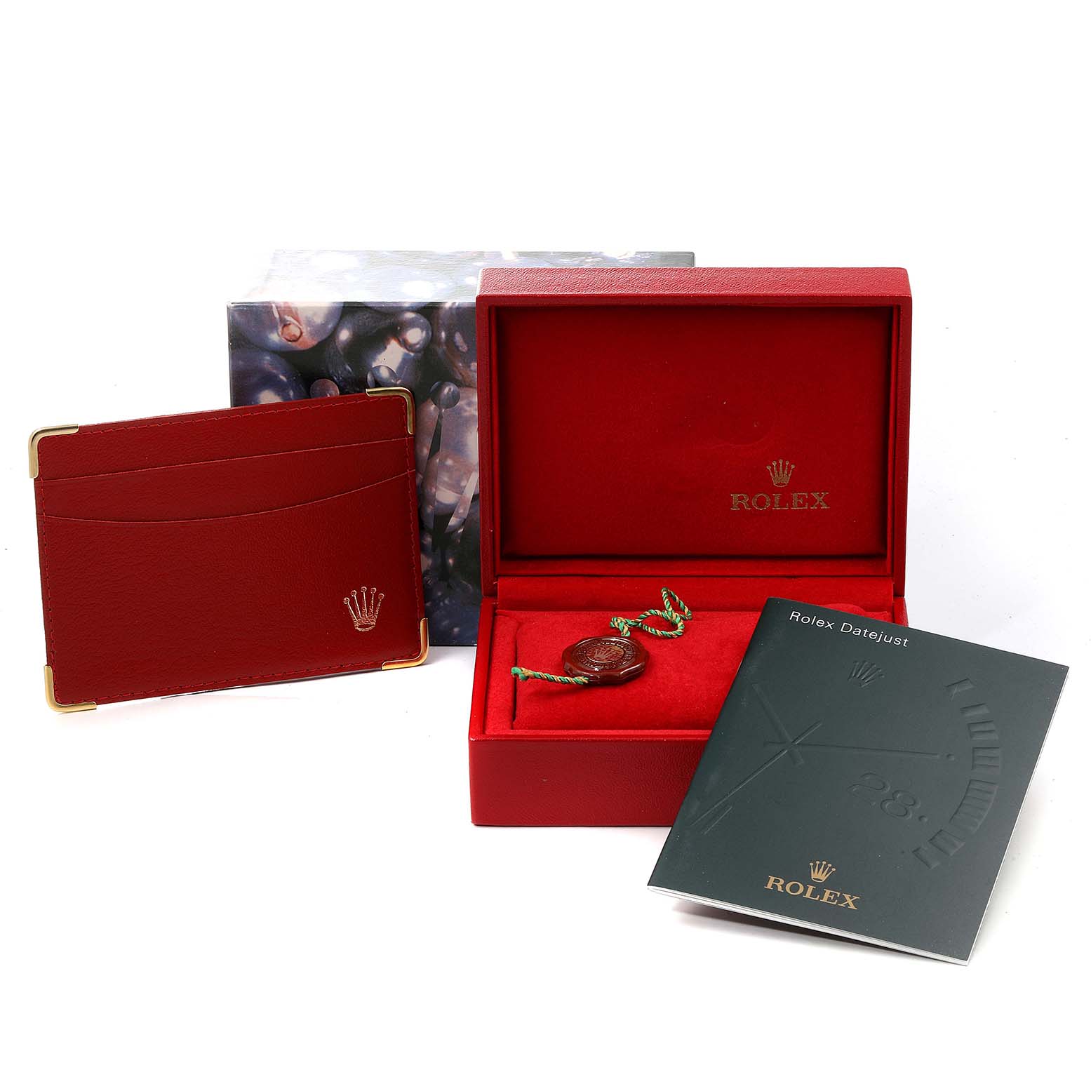 The image shows the packaging and accessories for a Rolex President 79179 Women's White Gold Silver Dial 79179 Women's White Gold Silver Dial model, including a red box, booklet, and card holder.