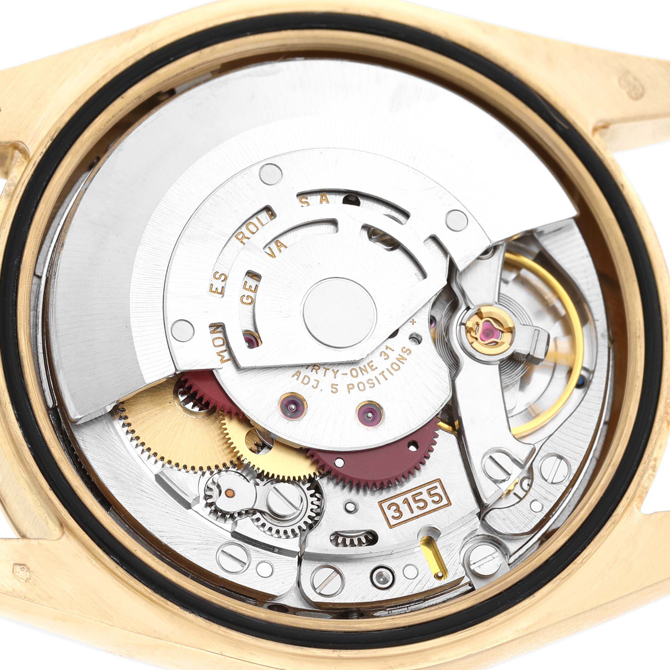 The image shows the Rolex President 118208 Men's Yellow Gold Black Dial model's movement from the back, revealing gears and mechanical components.