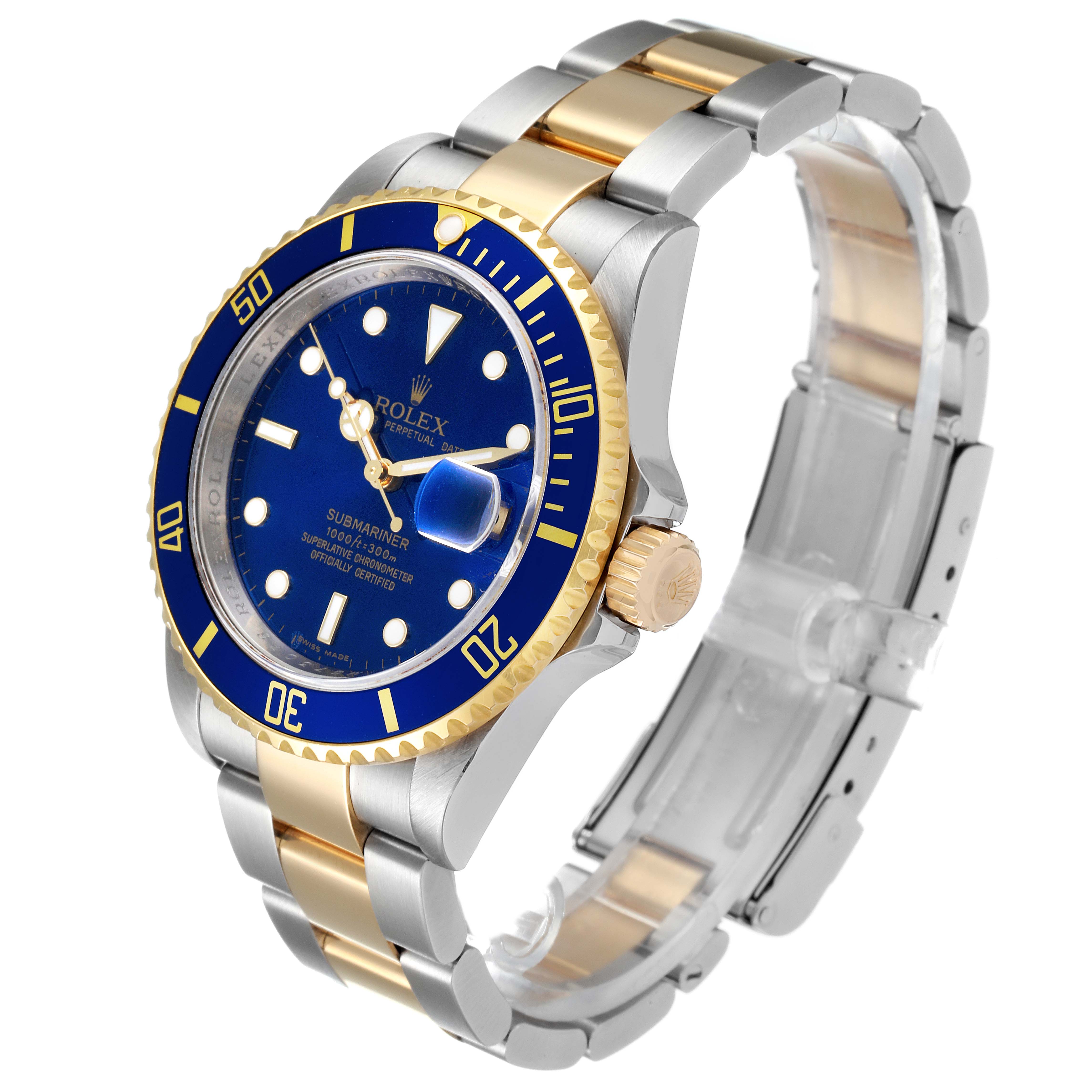 The Rolex Submariner 16613 Men
s Steel and Gold (two tone) Blue Dial 16613 Men
s Steel and Gold (two tone) Blue Dial watch is shown in a three-quarter angle, displaying its blue dial, gold bezel, and two-tone bracelet.