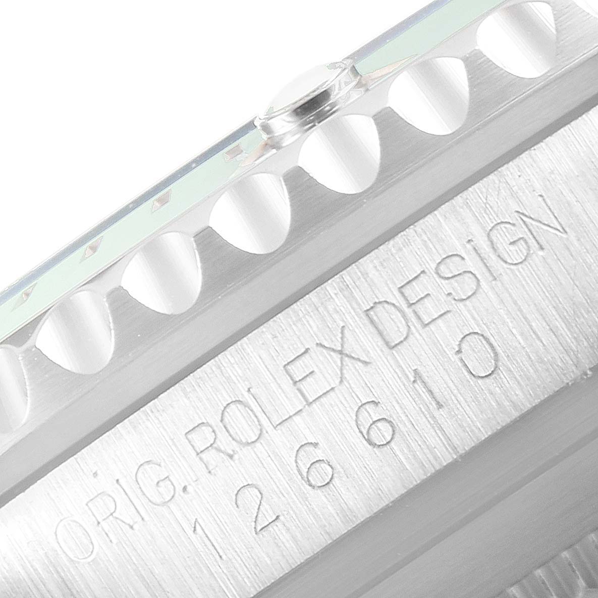 This image shows a close-up of the engraved bezel and the side of the case of a Rolex Submariner 126610LV Men's Stainless Steel Black Dial 126610LV Men's Stainless Steel Black Dial watch.