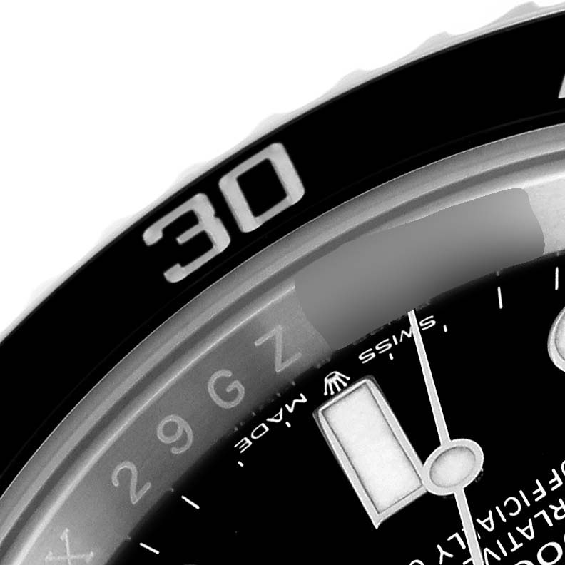 The image shows a close-up of the bezel and part of the dial of a Rolex Submariner 124060 Men's Stainless Steel Black Dial 124060 Men's Stainless Steel Black Dial watch.