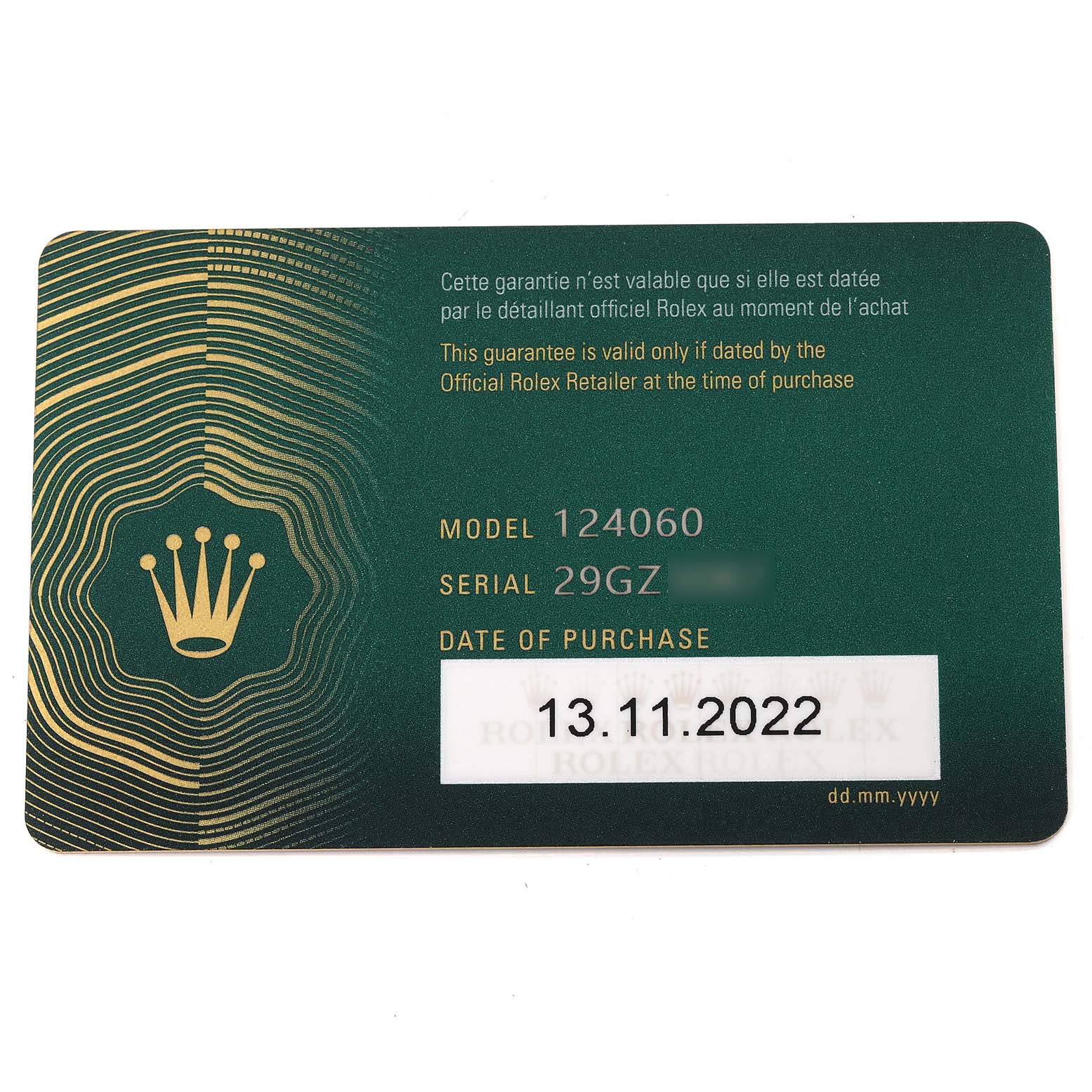 This is a guarantee card for the Rolex Submariner 124060 Men's Stainless Steel Black Dial 124060 Men's Stainless Steel Black Dial model 124060, showing the serial number and date of purchase.